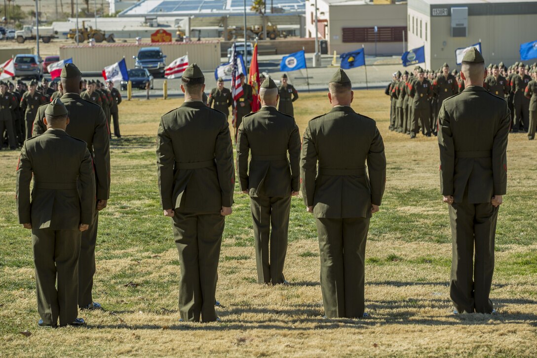1st Sgt. Joseph V. Standifird, company first sergeant, 2nd Battalion 7th Marine Regiment, gives the command for the staff to fall in during the battalion’s 75th anniversary and battle colors rededication ceremony at Lance Cpl. Torrey L. Gray Field, Jan. 8, 2016. (Official Marine Corps photo by Lance Cpl. Levi Schultz/Released)