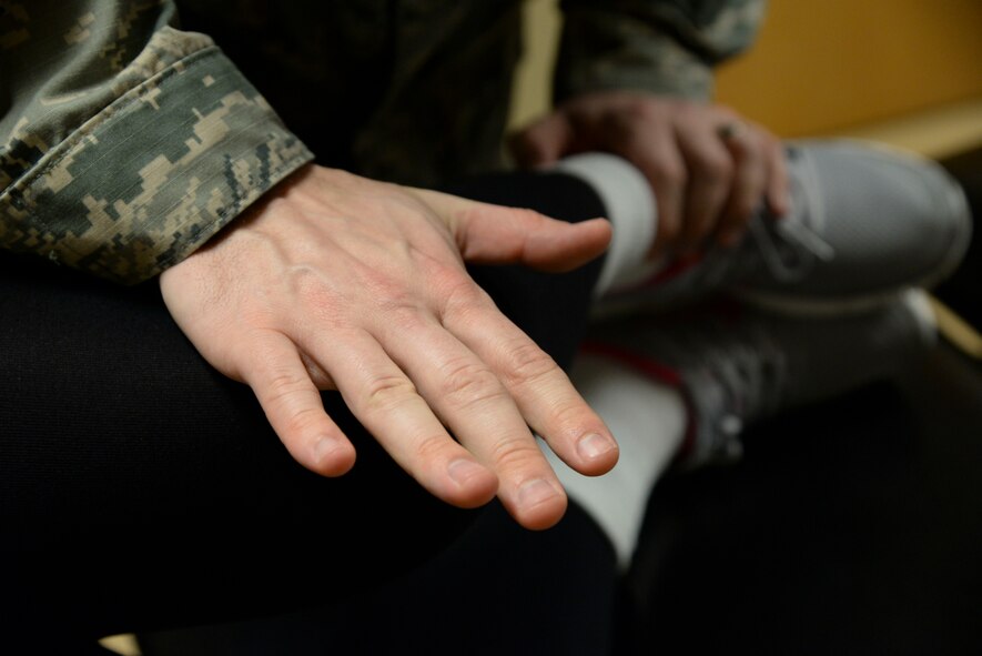 Capt. Scott Cheney, 2nd Medical Operation Squadron physical therapy element commander, conducts a hip rotational strength test at Barksdale Air Force Base, La., Jan. 12, 2016. With the direct access clinic, military members can receive immediate care without a referral from their primary care provider. After seeing a physical therapist, the patient will receive an exercise program to properly recover from the injury. (U.S. Air Force photo/Senior Airman Jannelle Dickey