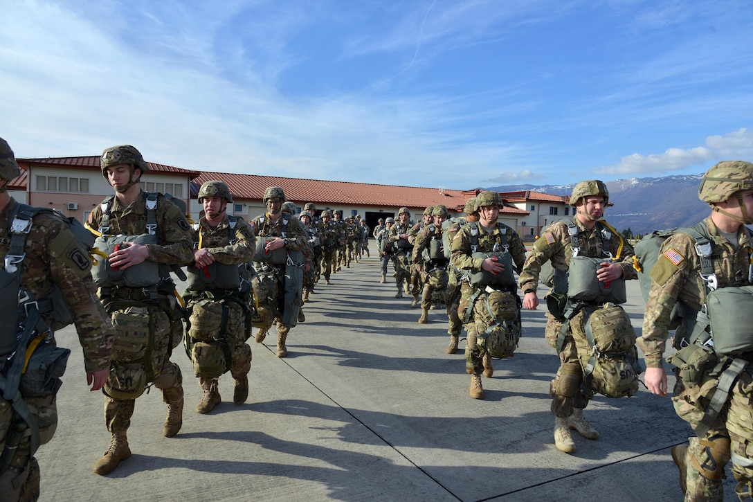 U.S. Army paratroopers prepare to board an Air Force C-130 Hercules aircraft on Aviano Air Base, Italy, Jan. 8, 2016. U.S. Army photo by Massimo Bovo