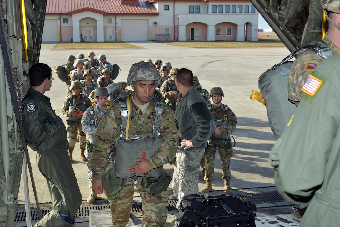 U.S. paratroopers board a U.S. Air Force C-130 Hercules on Aviano Air Base, Italy, Jan. 8, 2016. U.S. Army photo by Massimo Bovo