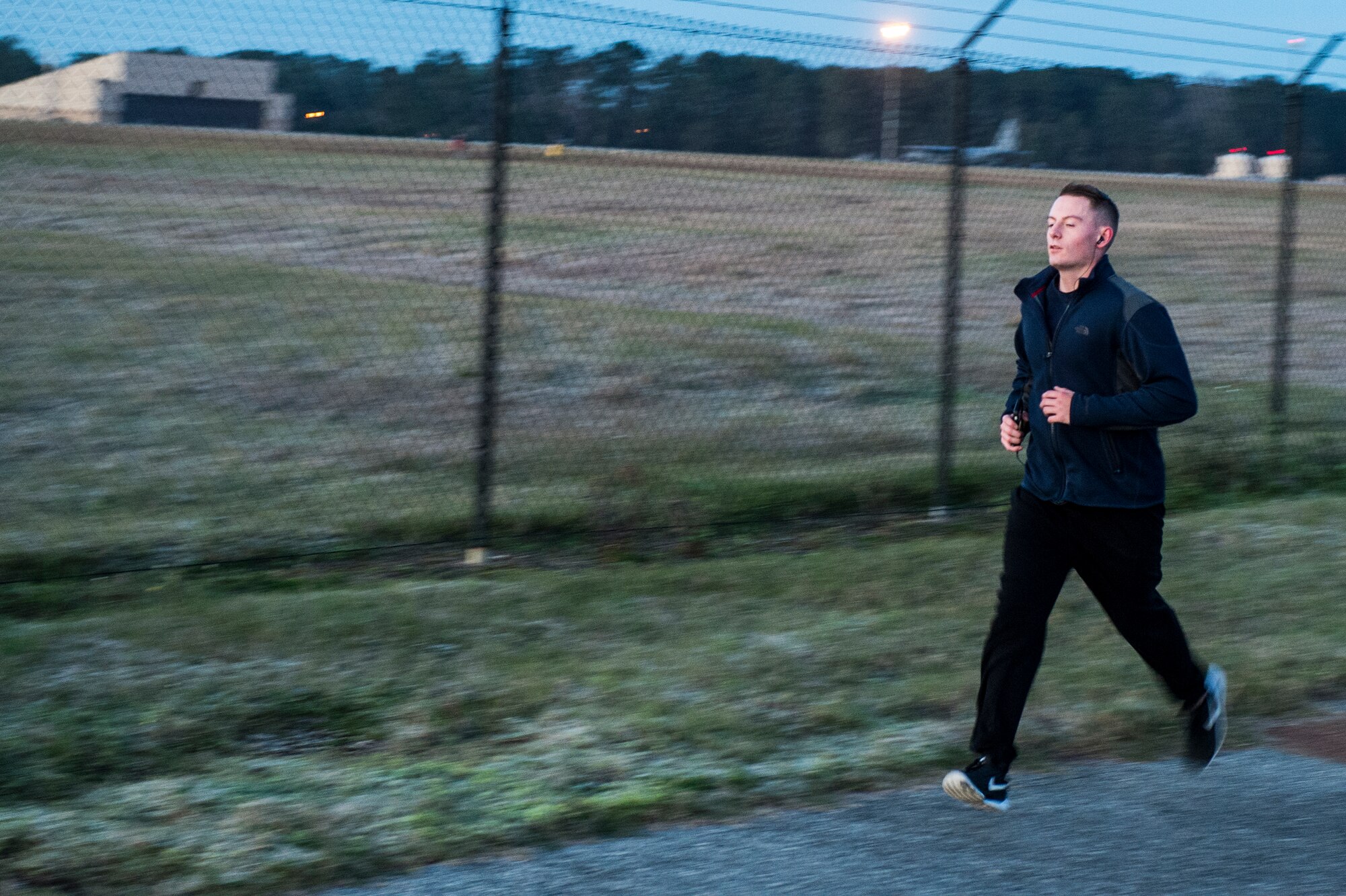 U.S. Air Force Airman 1st Class Daniel Cassidy, 71st Aircraft Maintenance Unit electronic warfare journeyman, runs during the Martin Luther King Jr. Day 5K run, Jan. 13, 2016, at Moody Air Force Base, Ga. During the civil rights movement, MLK served as one of the chief spokesmen and is remembered for his nonviolent activism. (U.S. Air Force photo by Senior Airman Ceaira Tinsley/Released)