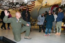 Lieutenant Col. Lanson Ross III, 459th Operations Group chief of operations, explains the mechanics and function of a KC-135R Stratotanker engine to a group of Luke C. Moore Academy students during a tour here Jan. 7, 2016. Students were able to tour the cockpit, boom pod and cargo hold as well as speak with a pilot, boom operator and in-flight medics during their visit. (U.S. Air Force photo by Staff Sgt. Kat Justen)