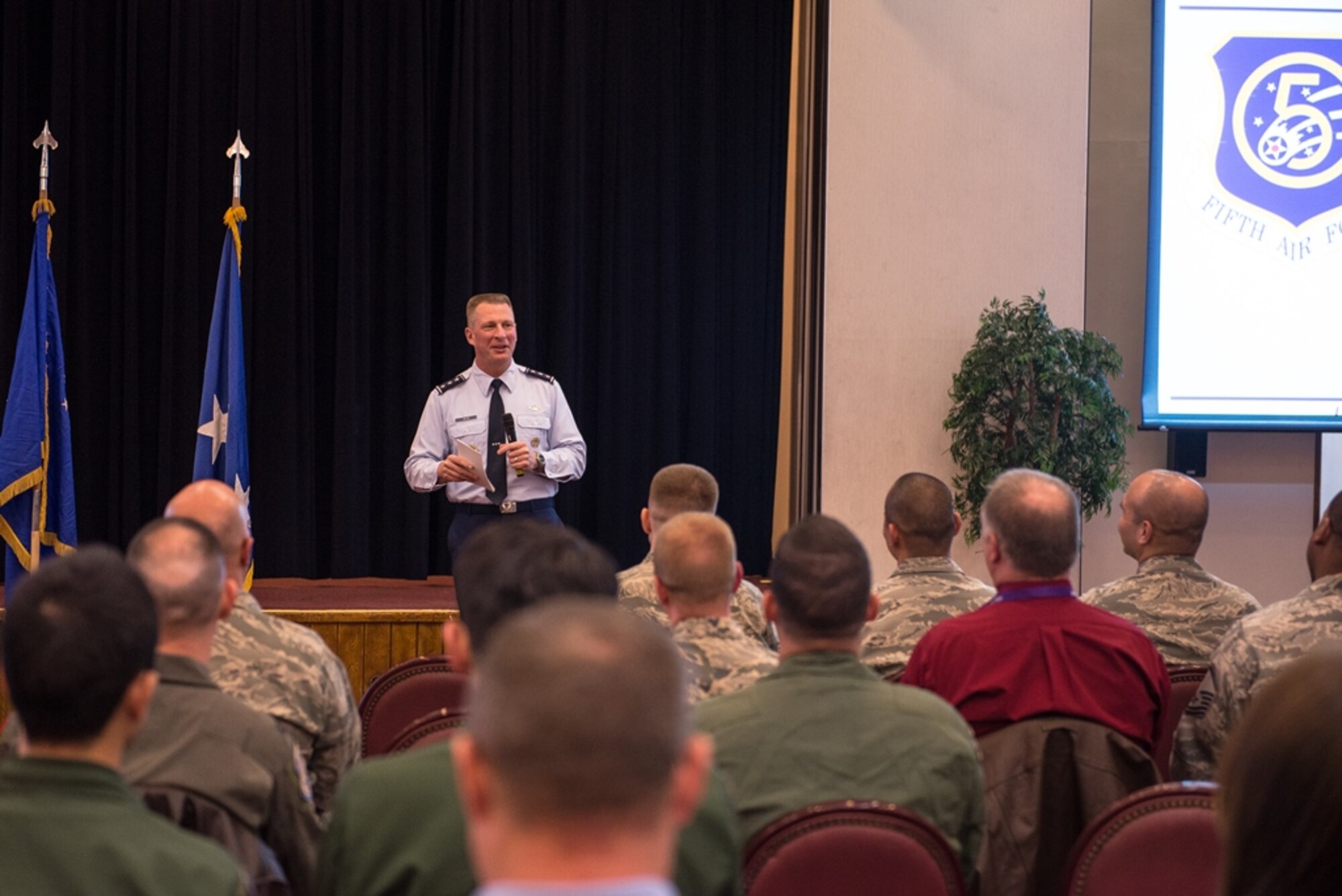 Lt. Gen. John L. Dolan, U.S. Forces, Japan and Fifth Air Force commander, speaks to the audience during his commander’s call at Yokota Air Base, Japan, Jan. 7, 2016. Dolan took command of USFJ and 5AF in June of 2015. (U.S. Air Force photo by Staff Sgt. Michael Smith/Released)
