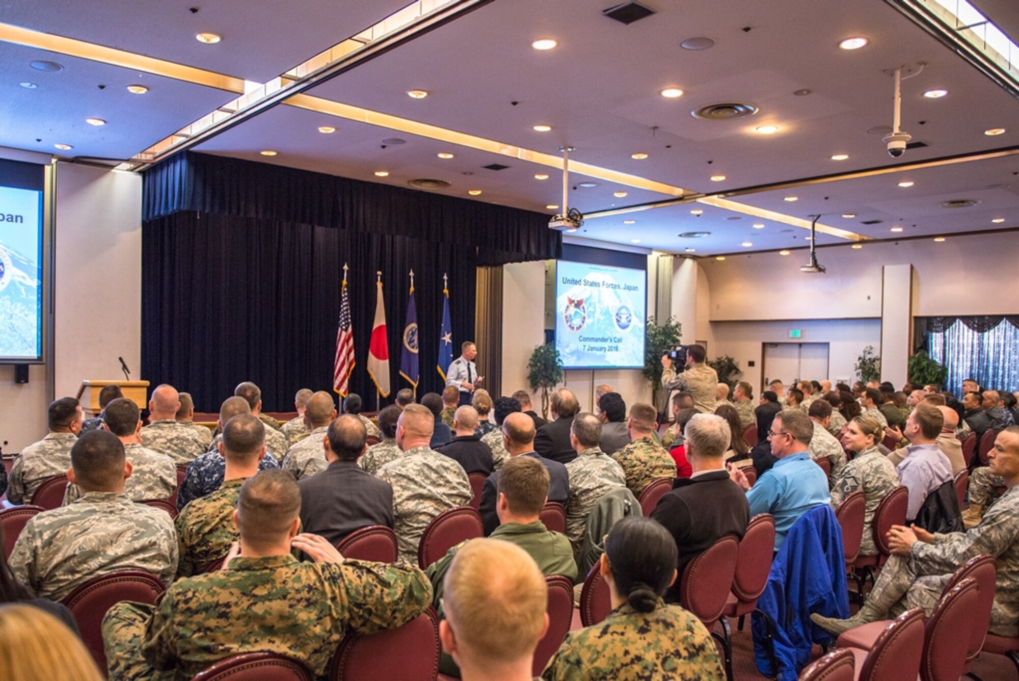 Lt. Gen. John L. Dolan, U.S. Forces, Japan and Fifth Air Force commander, speaks to the audience during his commander’s call at Yokota Air Base, Japan, Jan. 7, 2016. Dolan used the opportunity to welcome back everyone after the holidays and review the accomplishments that took place last year. (U.S. Air Force photo by Staff Sgt. Michael Smith/Released)