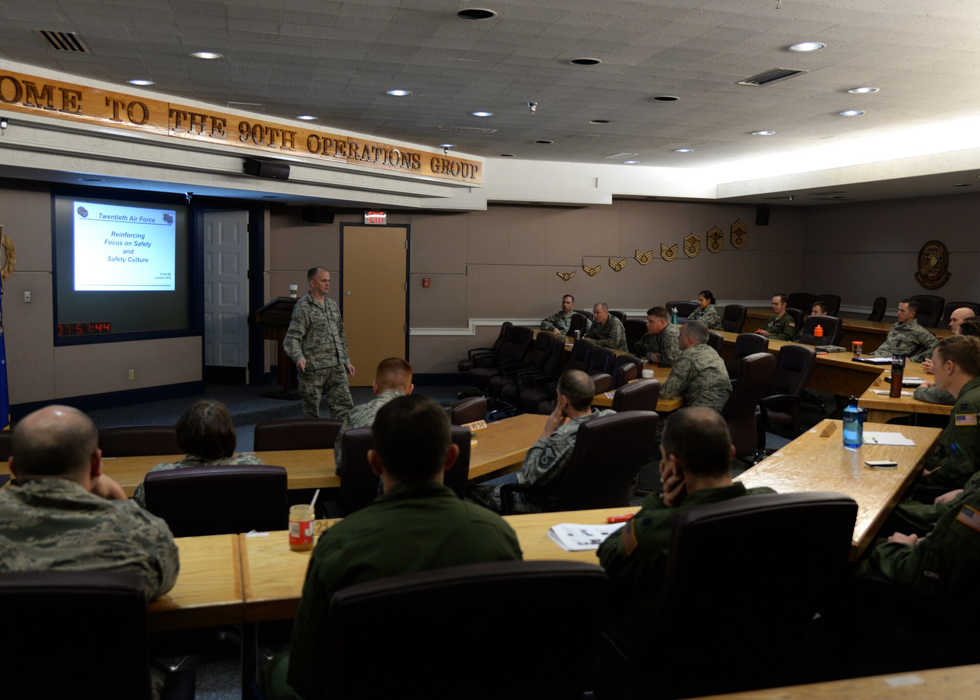 Col. Todd Sauls, 90th Operations Group commander, talks with missile operations leadership inside the 90th OG building on F.E. Warren Air Force Base, Wyo., Jan. 11, 2016, during a 20th Air Force Safety Down-Day. The down day was part of a 20th Air Force wide initiative to reinforce safety as a high priority. (U.S. Air Force photo by Airman 1st Class Malcolm Mayfield)