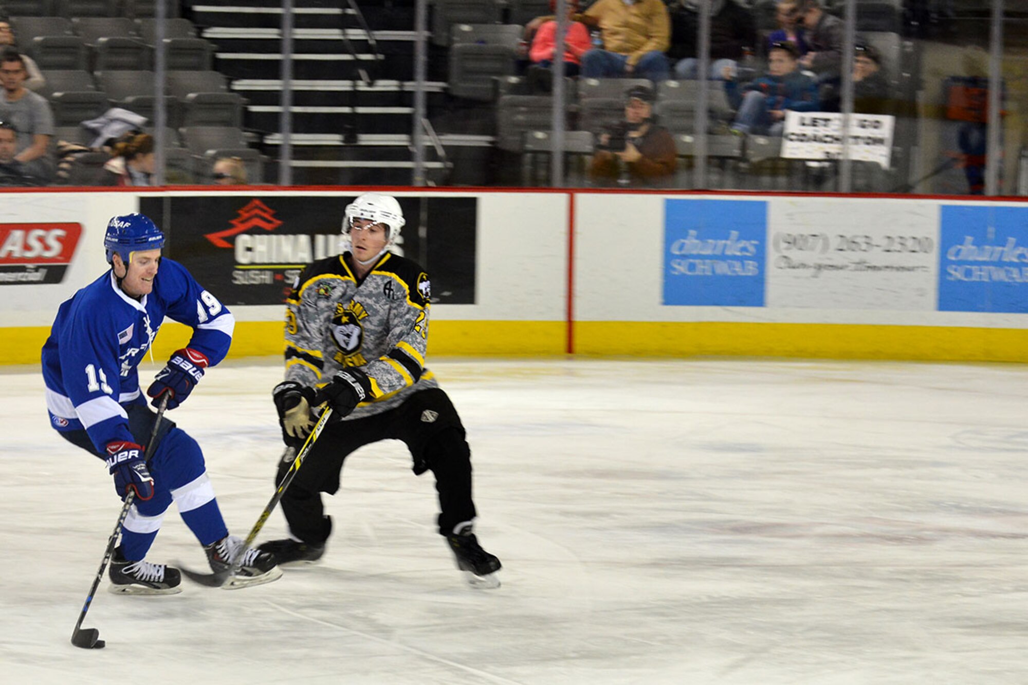 The annual JBER Air Force vs. Army hockey match was at the Sullivan Arena Jan 9. The Army came back from a 4-1 point deficit to win the game in a shoot-out and a final score of 7-6. (Air Force photo by Airman 1st Class Kyle Johnson/Released)