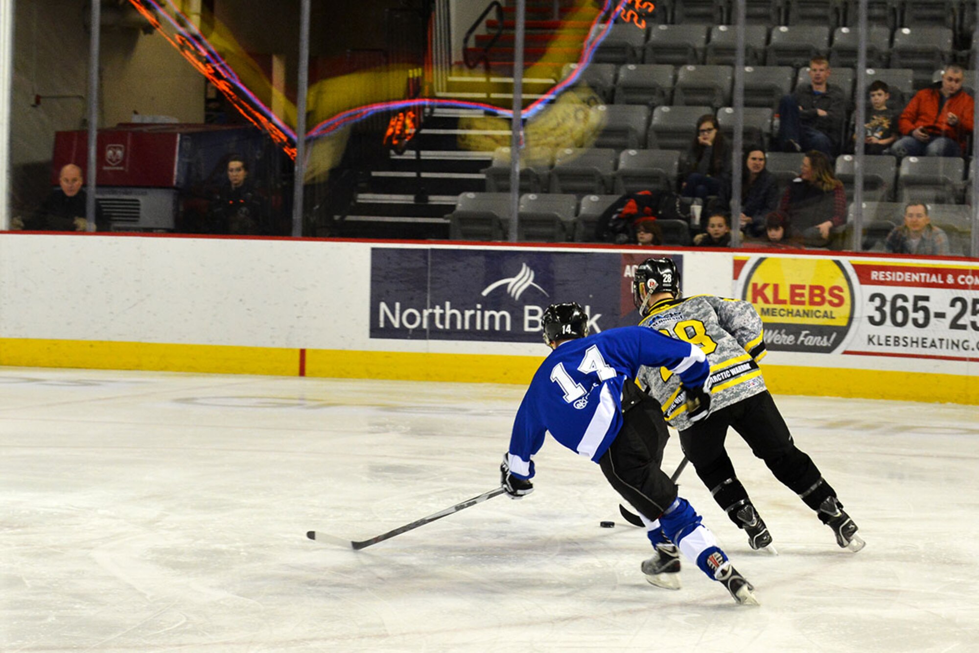 The annual JBER Air Force vs. Army hockey match was at the Sullivan Arena Jan 9. The Army came back from a 4-1 point deficit to win the game in a shoot-out and a final score of 7-6. (Air Force photo by Airman 1st Class Kyle Johnson/Released)
