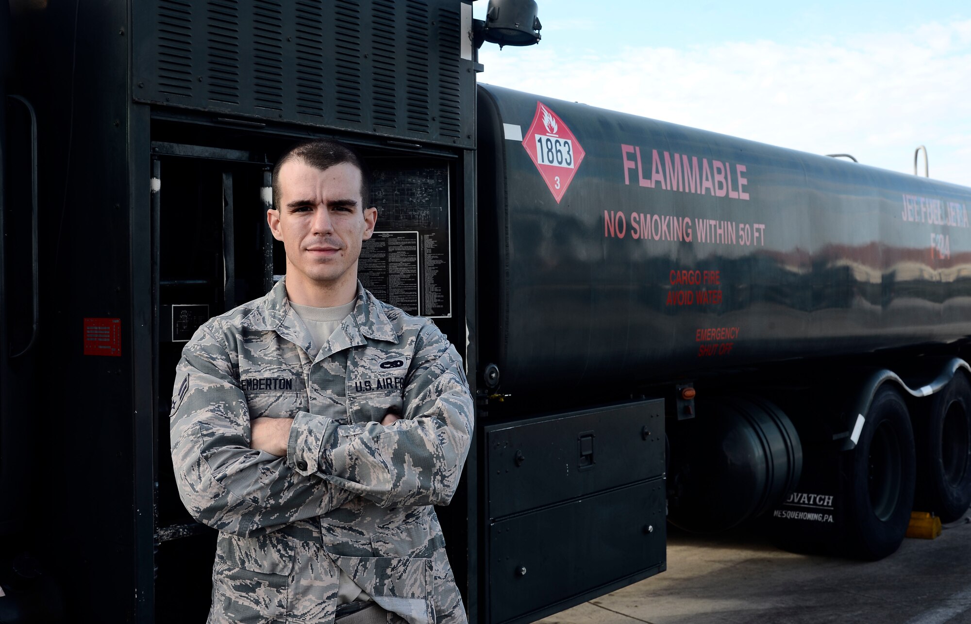 Airman 1st Class Keith Emberton, a fuel specialist and distribution driver with the 6th Logistics Readiness Squadron, poses in front of a fuel truck at MacDill Air Force Base Fla., Jan. 6, 2016. Emberton’s main responsibility is performing daily fuel checks and providing fuel to aircraft. (U.S. Air Force photo by Senior Airman Tori Schultz)