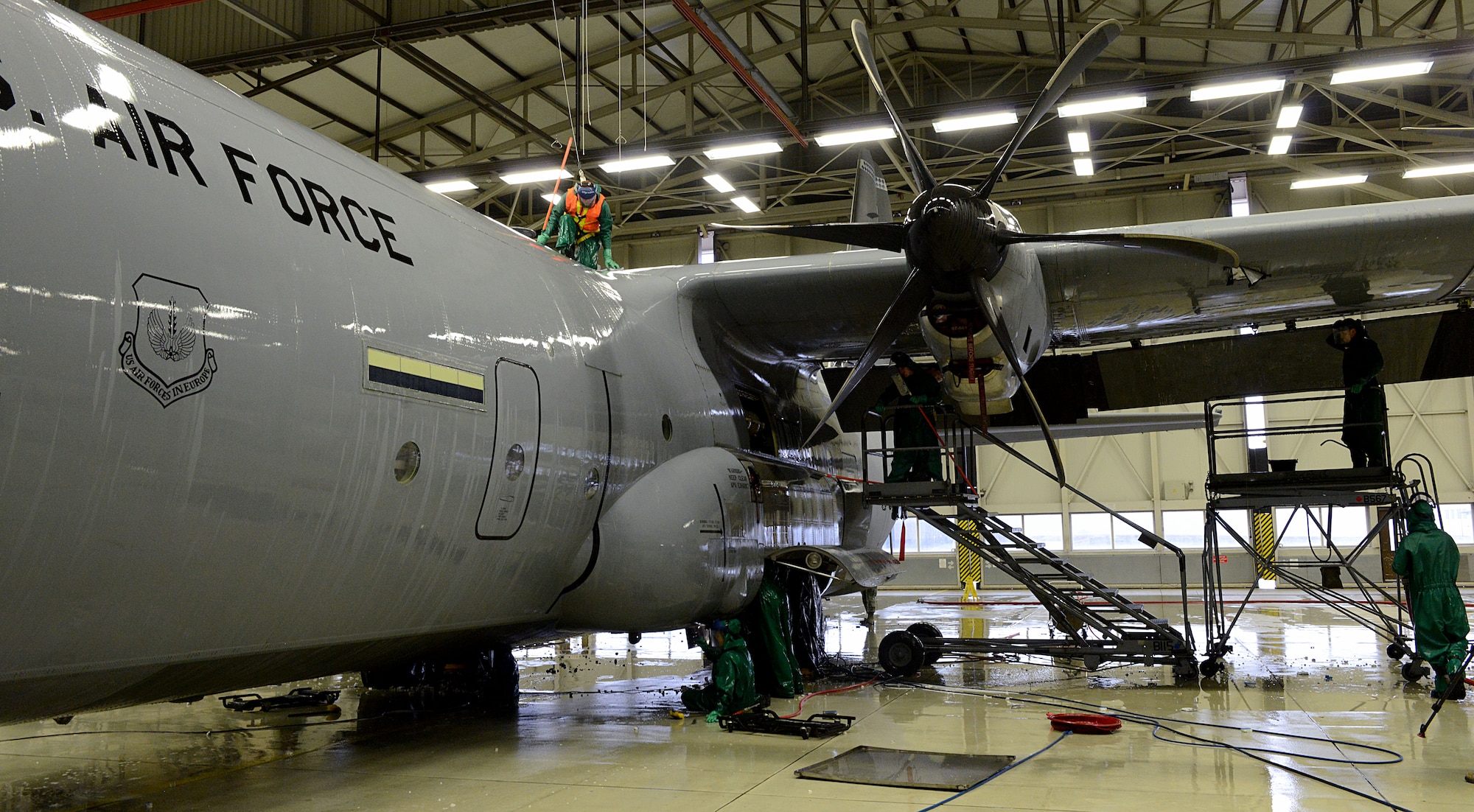 86th Maintenance Squadron Airmen wash a C-130J Super Hercules before a C-2 isochronal (ISO) inspection Jan. 4, 2016, at Ramstein Air Base, Germany. This examination marks the 14th and final C-2 ISO inspection for the 86th Airlift Wing until 2020. C-2 ISO inspections last approximately two weeks. (U.S. Air Force photo/Staff Sgt. Timothy Moore)