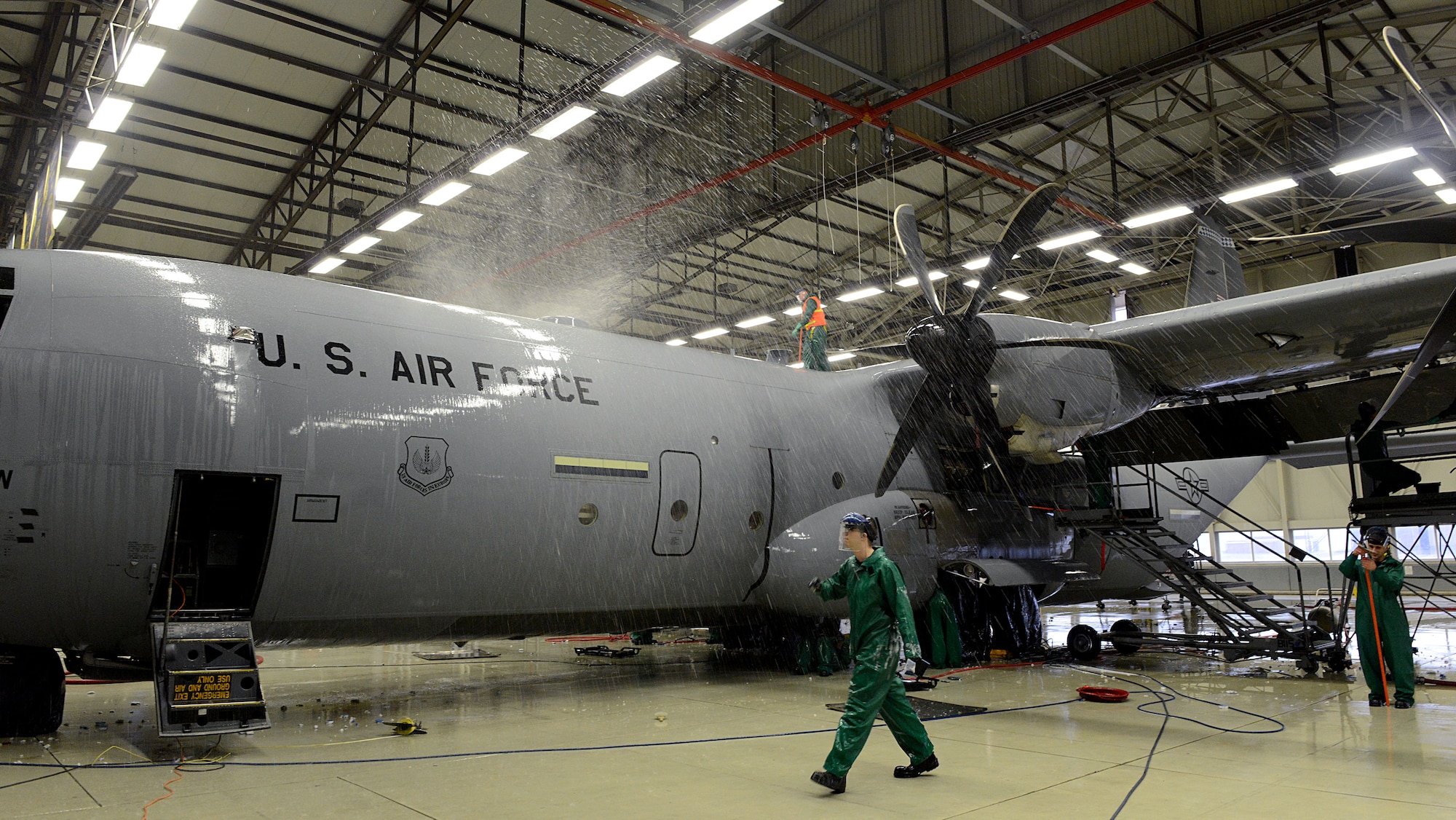 86th Maintenance Squadron Airmen wash a C-130J Super Hercules before a C-2 isochronal (ISO) inspection Jan. 4, 2016, at Ramstein Air Base, Germany. This examination marks the 14th and final C-2 ISO inspection for the 86th Airlift Wing until 2020. C-2 ISO inspections last approximately two weeks. (U.S. Air Force photo/Staff Sgt. Timothy Moore)