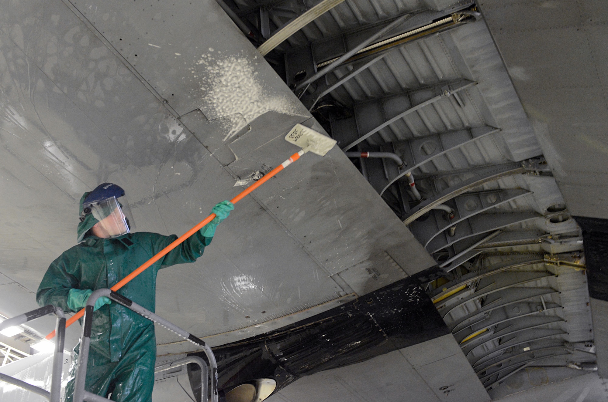 Airman 1st Class Zachary Ohannessian, 86th Maintenance Squadron crew chief, scrubs the wing of a C-130J Super Hercules Jan. 4, 2016, at Ramstein Air Base, Germany. The wash is preparation work for the aircraft’s C-2 isochronal (ISO) inspection. An ISO inspection is a scheduled, extensive examination of an aircraft to maintain its functionality and perform preventive maintenance. (U.S. Air Force photo/Staff Sgt. Timothy Moore)