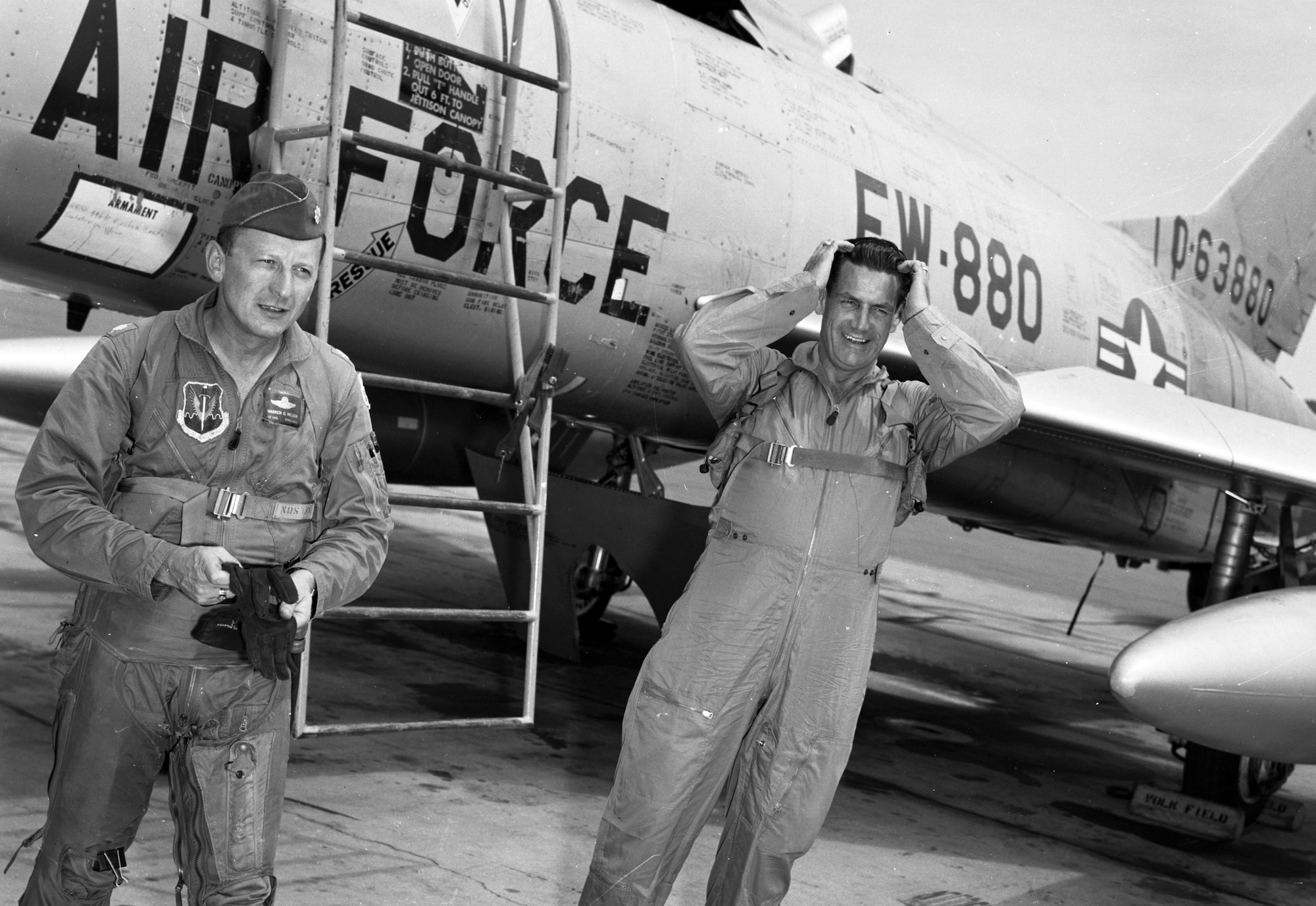 Lt. Col. Warren G. Nelson, 185th Tactical Fighter Group, along with Iowa Governor Harold Hughes, step off an Iowa Air National Guard F-100F at the Volk Filed Combat Readiness Training Center in Wisconsin on July 22, 1966. Hughes was treated to a backseat ride in the two seat training model of the F-100, tail number 880, while it was assigned to the Iowa National Guard’s 185th Fighter Group in Sioux City, Iowa.
U.S. Air National Guard Photo by Airman 1st Class Dwain Volwieler 185th TFG Photographer