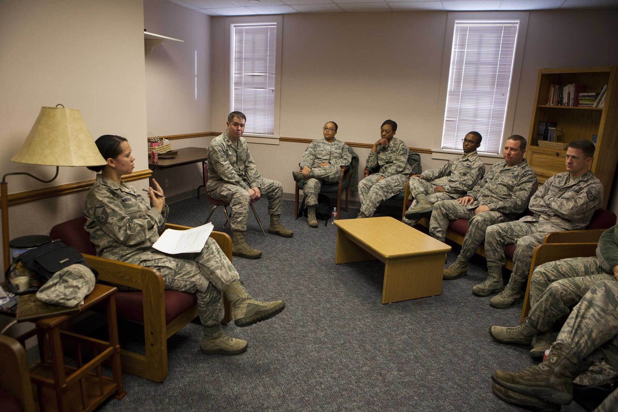 MSgt. Gloria Wilson, 90th Missile Wing Public Affairs superintendant, discusses a safety scenario with a group of wing staff personnel on F.E. Warren Air Force Base, Wyo., Jan. 11, 2016, during a 20th Air Force Safety Down-Day. The down day was part of a 20th Air Force wide initiative to reinforce safety as a high priority. (U.S. Air Force photo by Lan Kim)