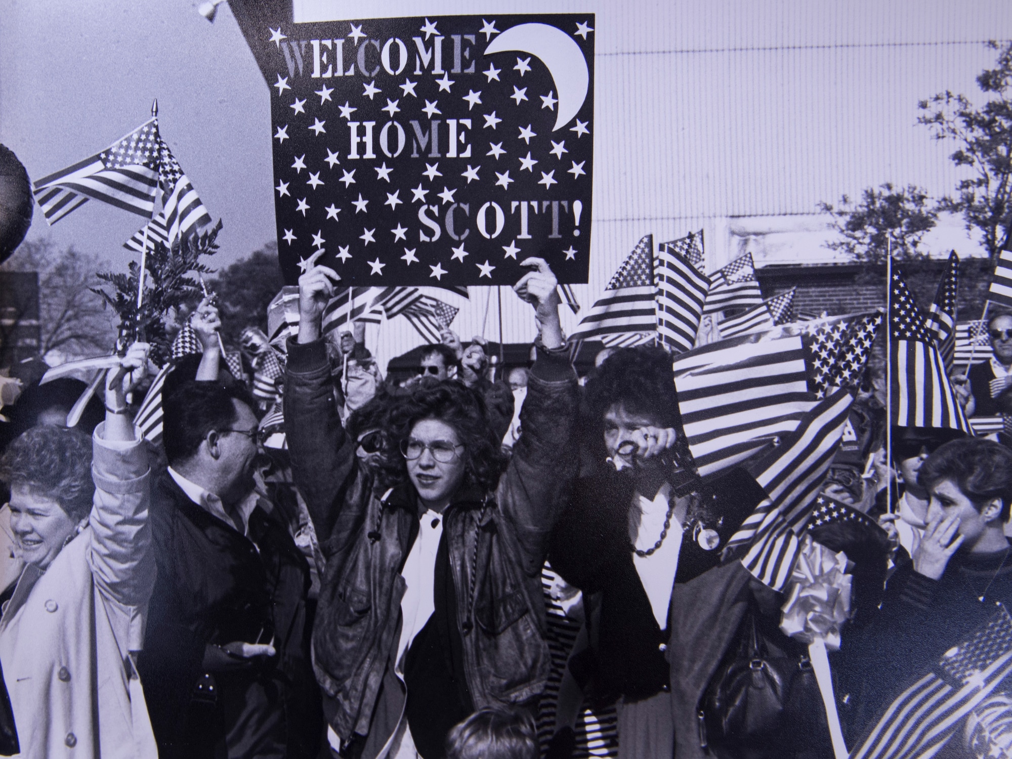 Family and friends wait as Airmen deployed during Operation Desert Storm arrive April 1, 1991, at Scott Air Force Base, Illinois. Missions performed and supported by Team Scott Airmen included C-21, C-29, and Aerospace Medical and Evacuation missions. (Courtesy photo)