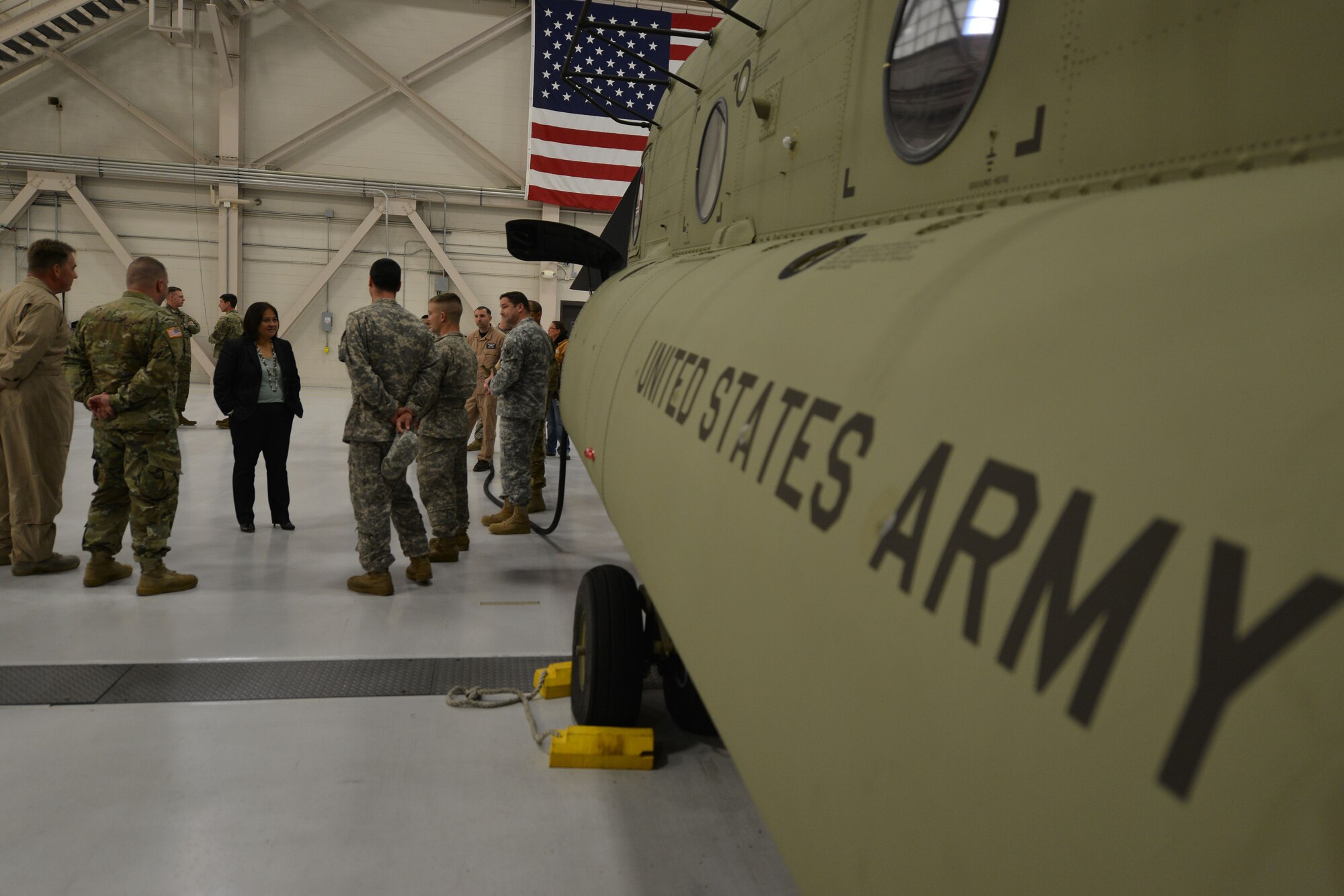 The Honorable Debra Wada, Assistant Secretary of the Army for Manpower and Reserve Affairs, speaks with members of the 159th General Support Aviation Battalion at Fort Eustis, Va., Jan. 11, 2015. After touring CH-47 Chinook helicopters, Wada spoke with the group to gain insight about the missions and challenges the Service members face. (U.S. Air Force photo by Staff Sgt. Natasha Stannard)
