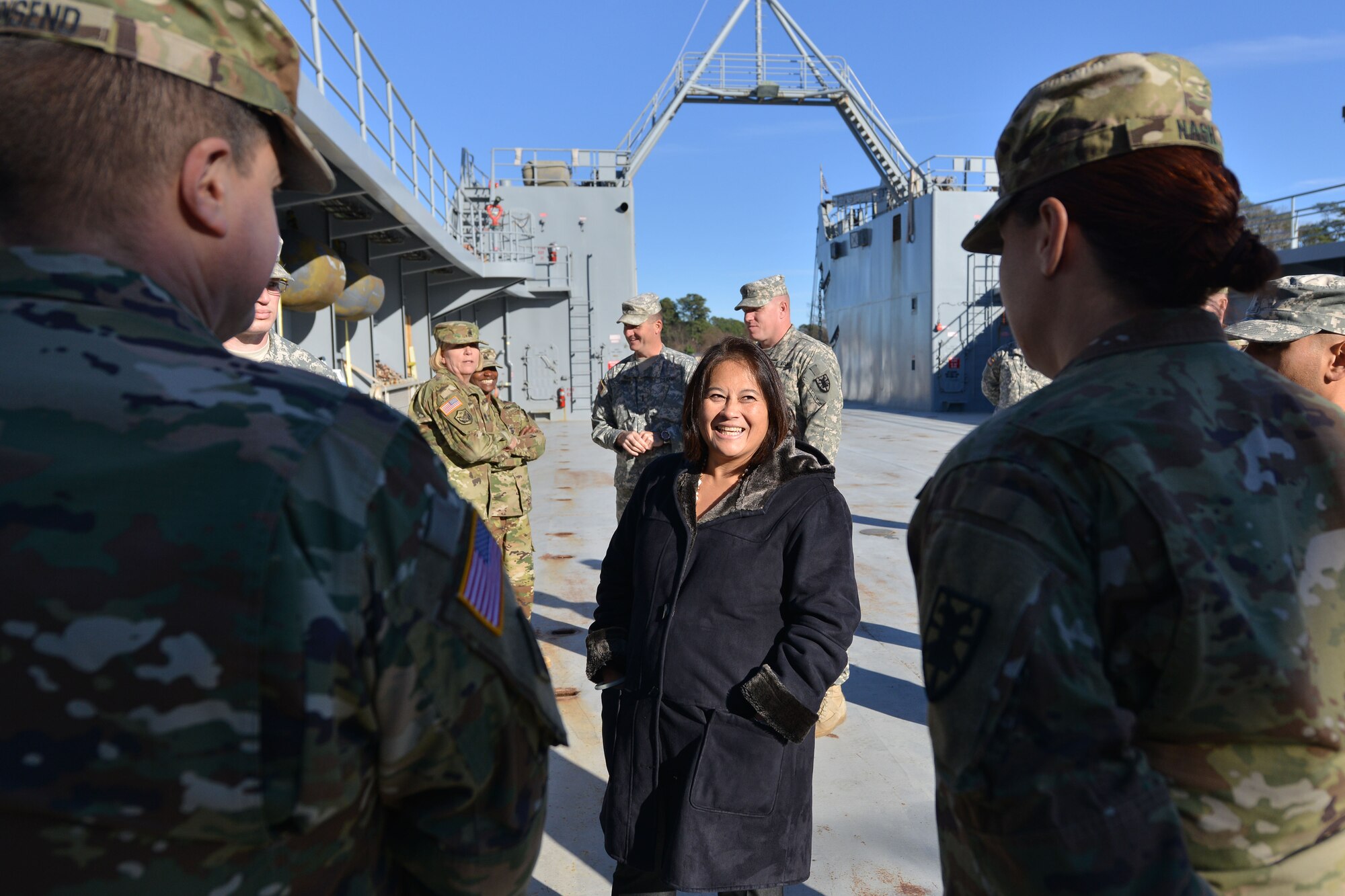 U.S. Army Col. Stacy Townsend, left, commander of the 7th Transportation Brigade (Expeditionary), and  Lt. Col. Kimberly Nash, right, commander of the 10th Transportation Battalion, brief the Honorable Debra Wada, Assistant Secretary of the Army for Manpower and Reserve Affairs, at Fort Eustis, Va., Jan. 11, 2015. During her tour, Wada visited with Soldiers ranging from water craftsmen to aviators, and Advanced Individual Training instructors. (U.S. Air Force photo by Staff Sgt. Natasha Stannard)