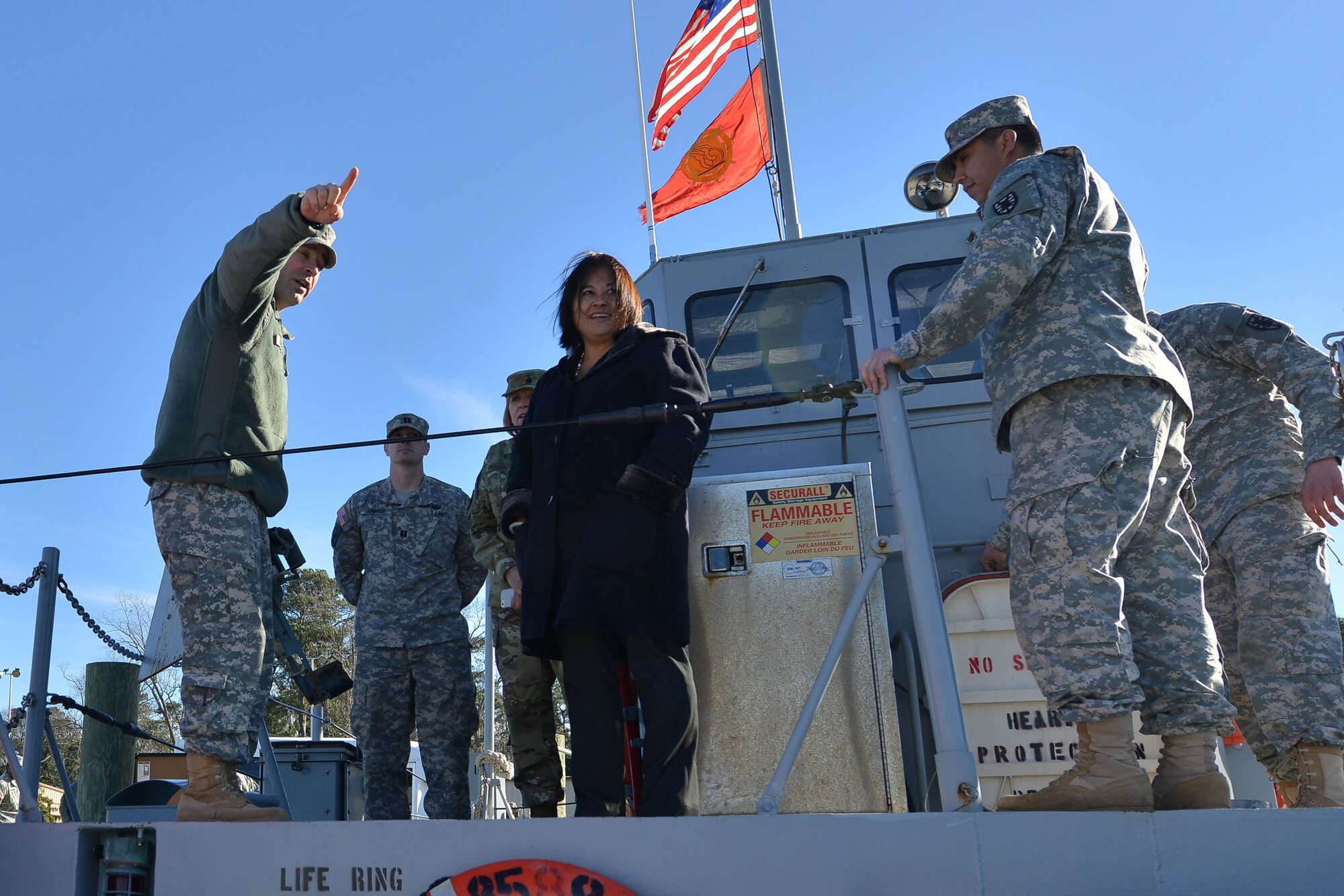 The Honorable Debra Wada, Assistant Secretary of the Army for Manpower and Reserve Affairs, tours the 7th Transportation Brigade’s (Expeditionary) vessels at Fort Eustis, Va., Jan. 11, 2015. Members of the brigade’s 10th and 11th Trans. Battalions went over the various missions their vessels support around the world. (U.S. Air Force photo by Staff Sgt. Natasha Stannard)