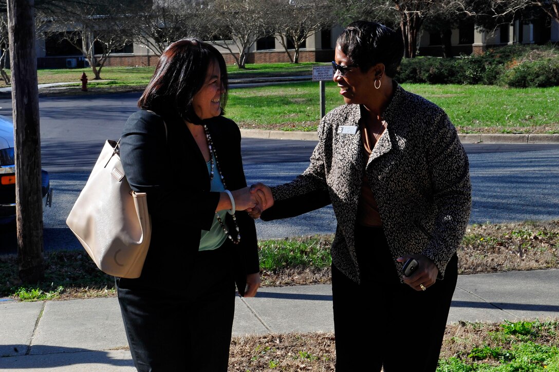 Donna Graves, protocol director for the U.S. Army Training and Doctrine Command Executive Services Office, greets the Honorable Debra Wada, Assistant Secretary of the Army for Manpower and Reserve Affairs at the 7th Transportation Brigade (Expeditionary) dining facility on Fort Eustis, Va., Jan. 11, 2016. During her visit, the ASA (M&RA) interacted with several Soldiers across the base to learn about their mission. (U.S. Air Force photo by Senior Airman Breonna Veal)
