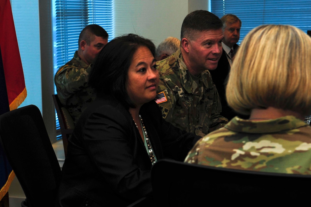 The Honorable Debra Wada, Assistant Secretary of the Army for Manpower and Reserve Affairs, listens to senior leaders of the U.S. Army Training and Doctrine Command (TRADOC) as they introduce themselves before an office call at the TRADOC headquarters building on Fort Eustis, Va., Jan. 11, 2016. As the ASA (M&RA), Wada serves as the Army's lead for civilian and military manpower policy, human resources, reviewer of Soldier records, reserve/active component force structure policy and more. (U.S. Air Force photo by Senior Airman Breonna Veal)