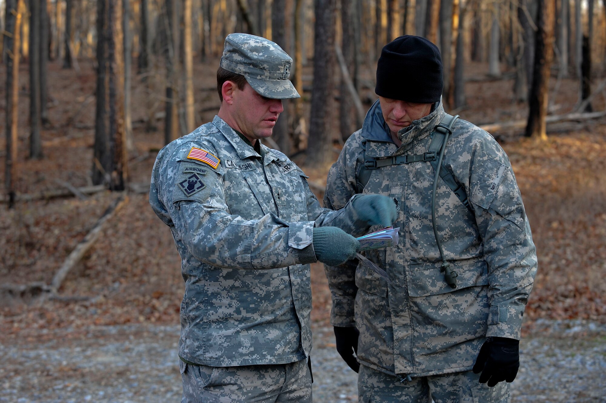 U.S. Soldiers assigned to the 73rd Transportation Floating Craft Company of the 19th Transportation Battalion, 7th Transportation Brigade (Expeditionary), review the points of training during a field training exercise at Fort A.P. Hill, Va., Jan. 12, 2016. The Fort Eustis Soldiers participated in the FTX to validate training in land navigation, individual movement, warrior tasks and drills. (U.S. Air Force photo by Senior Airman Breonna Veal) 