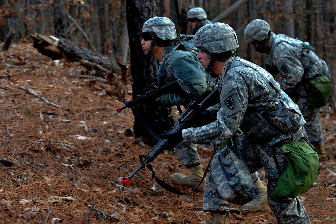 U.S. Soldiers assigned to the 73rd Transportation Floating Craft Company of the 19th Transportation Battalion, 7th Transportation Brigade (Expeditionary), prepare to ambush a bunker during a field training exercise at Fort A.P. Hill, Va., Jan. 12, 2016. The exercise included various training opportunities including area reconnaissance, terrorist ambush and improvised explosive device reaction. (U.S. Air Force photo by Senior Airman Breonna Veal)