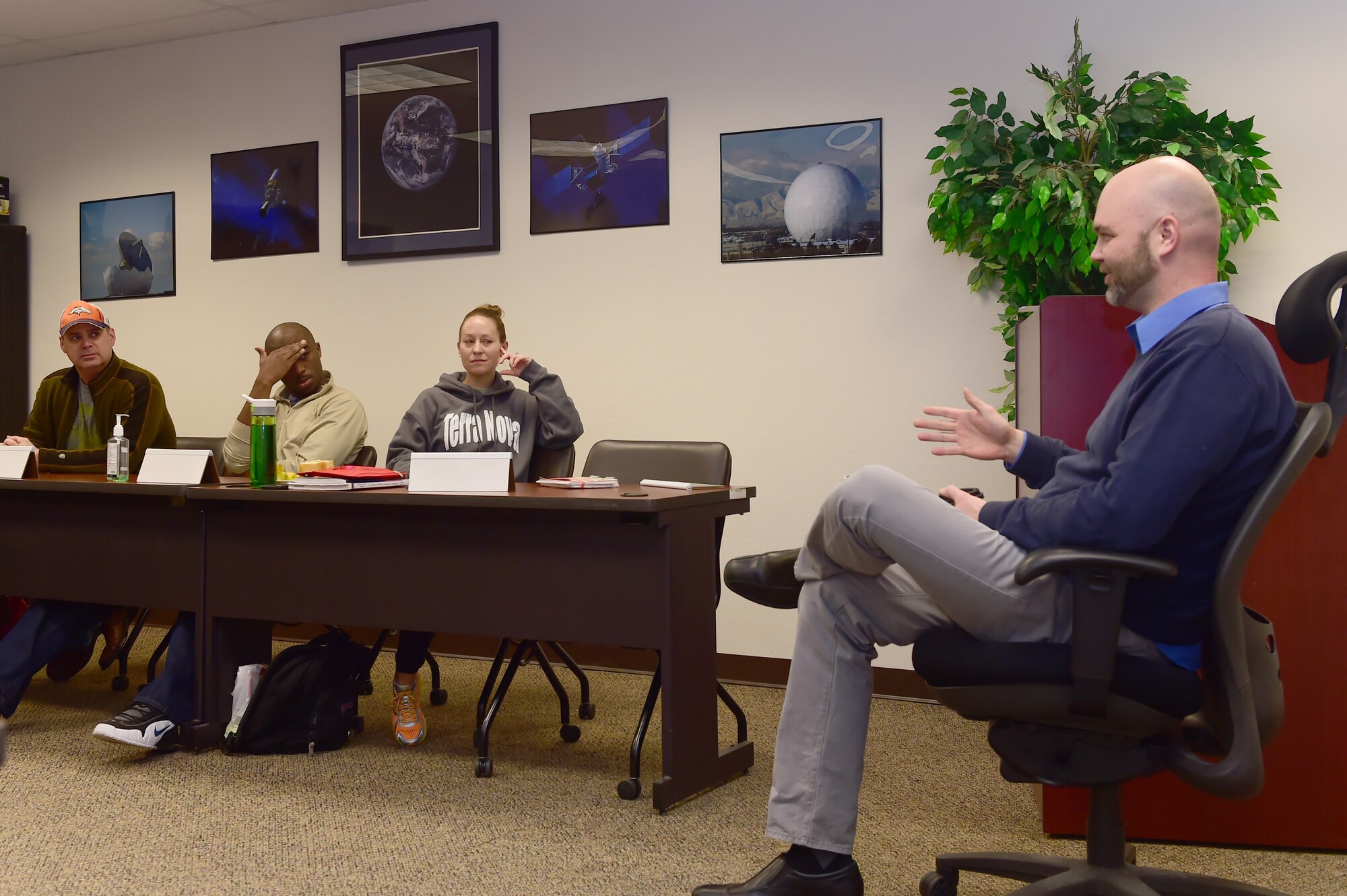 A professor from Colorado Christian University introduces course requirements to students Jan. 12, 2016, at the Airmen Center of Excellence on Buckley Air Force Base, Colo. CCU partnered with Buckley AFB to provide college level courses on base for members of Buckley to attend. (U.S. Air Force photo by Airman 1st Class Luke W. Nowakowski/Released) 