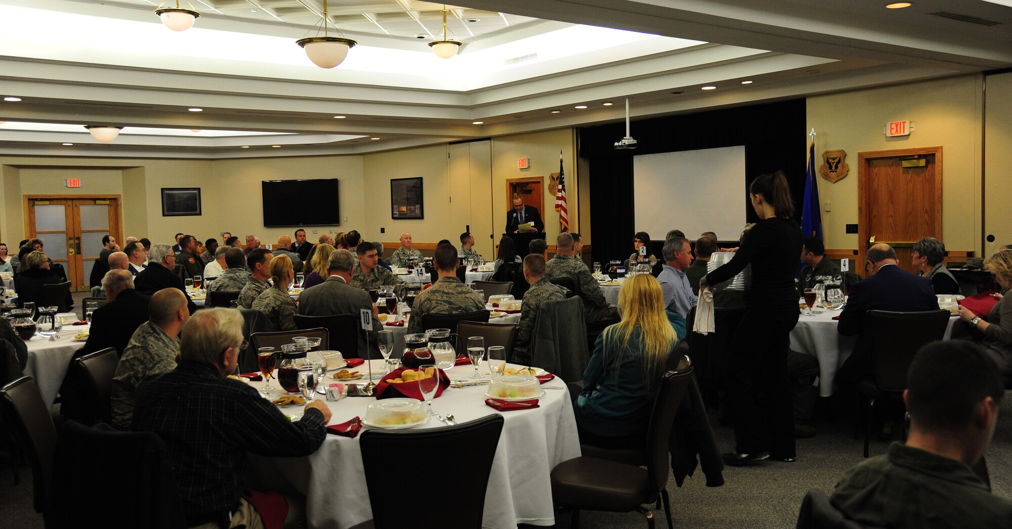 Greg Frencken, the Base Community Council (BCC) president, speaks during the BCC luncheon at Whiteman Air Force Base, Mo., Jan. 6, 2016. For more than 20 years, Whiteman has been building and maintaining relationships within 18 surrounding communities. BCC luncheons are hosted by one or more communities and are scheduled the first Wednesday of each month and the next one will be February 3. (U.S. Air Force photo by Senior Airman Joel Pfiester)