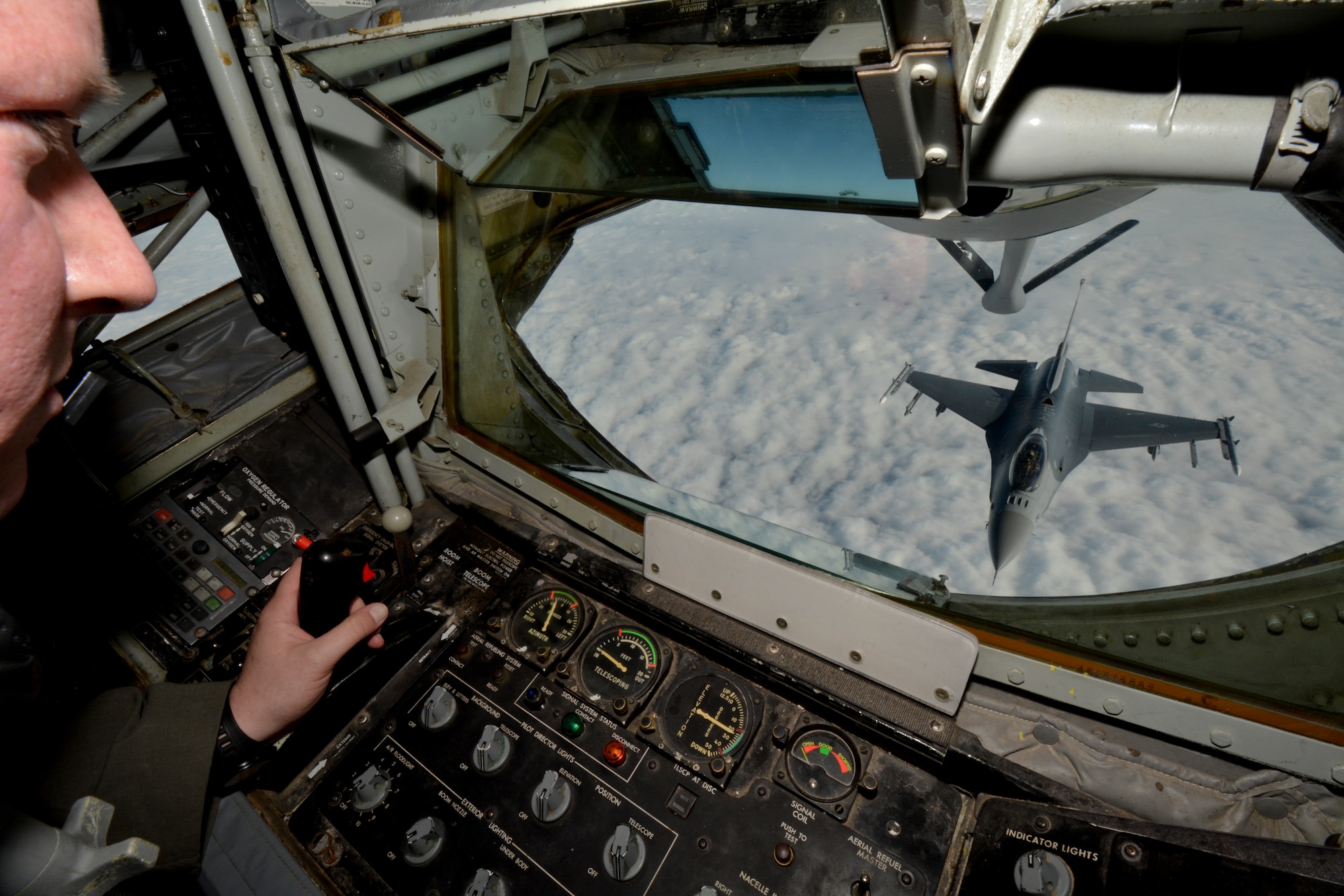 An F-16C Fighting Falcon approaches the boom of a KC-135R Stratotanker for refueling over Montgomery, Ala., January 10, 2016. The mission was part of an incentive flight involing the 117th Air Refeuling Wing and the 187th Fighter Wing. (U.S. Air National Guard photo by: Capt. Jonathan Russell/Released)
