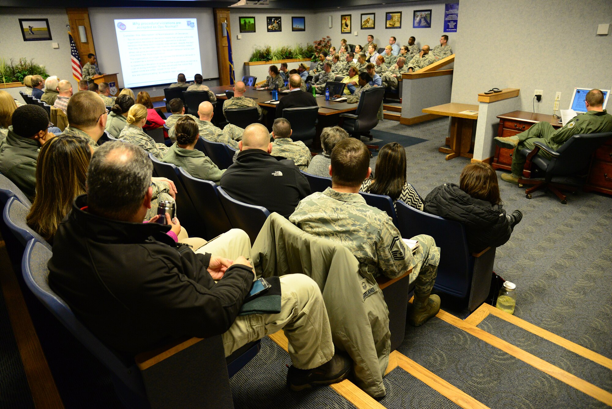 Staff Sgt. Dorian Lewis, 341st Missile Wing safety technician, gives a briefing to the Wing Staff Agencies Jan. 11, 2016, at Malmstrom Air Force Base, Mont. The base held a Wing Safety Stand Down Day, where Airmen gathered together to discuss the importance of safety in the workplace as well as assessing risks to avoid complacency. (U.S. Air Force photo by Airman 1st Class Magen M. Reeves)