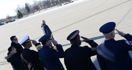 U.S. Navy Adm. Cecil D. Haney (third from left), U.S. Strategic Command (USSTRATCOM) commander, U.S. Army Command Sgt. Maj. Patrick Z. Alston (second from right), USSTRATCOM senior enlisted leader, and senior leaders from the 55th Wing salute as President Barack H. Obama arrives at Offutt Air Force Base, Neb. aboard Air Force One, Jan. 13, 2015. While here, the President gave a speech at the University of Nebraska Omahaâ€™s Baxter Arena and made a surprise visit to an Omaha-area resident. Key Nebraska leaders, including Nebraska Governor, Pete Ricketts; Omaha Mayor, Jean Stothert, and Bellevue Mayor, Rita Sanders; were also in attendance to welcome President Obama upon his arrival. One of nine DoD unified combatant commands, USSTRATCOM has global strategic missions, assigned through the Unified Command Plan, which include strategic deterrence; space operations; cyberspace operations; joint electronic warfare; global strike; missile defense; intelligence, surveillance and reconnaissance; combating weapons of mass destruction; and analysis and targeting. (USSTRATCOM photo by U.S. Air Force Staff Sgt. Jonathan Lovelady)