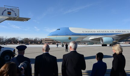 Local media and senior leaders from Nebraska and the 55th Wing look on as Air Force One is taxied into position on the flight line at Offutt Air Force Base, Neb., Jan. 13, 2015. U.S. Navy Adm. Cecil D. Haney (not pictured), U.S. Strategic Command (USSTRATCOM) commander and U.S. Army Command Sgt. Maj. Patrick Z. Alston (not pictured), USSTRATCOM senior enlisted leader, we on hand to welcome President Barack H. Obama upon his arrival. During his visit here, President Obama gave a speech at the University of Nebraska Omahaâ€™s Baxter Arena and made a surprise visit to an Omaha-area resident. Key Nebraska leaders who attended the arrival include Nebraska Governor, Pete Ricketts; Omaha Mayor, Jean Stothert, and Bellevue Mayor, Rita Sanders. One of nine DoD unified combatant commands, USSTRATCOM has global strategic missions, assigned through the Unified Command Plan, which include strategic deterrence; space operations; cyberspace operations; joint electronic warfare; global strike; missile defense; intelligence, surveillance and reconnaissance; combating weapons of mass destruction; and analysis and targeting. (USSTRATCOM photo by U.S. Air Force Staff Sgt. Jonathan Lovelady)
