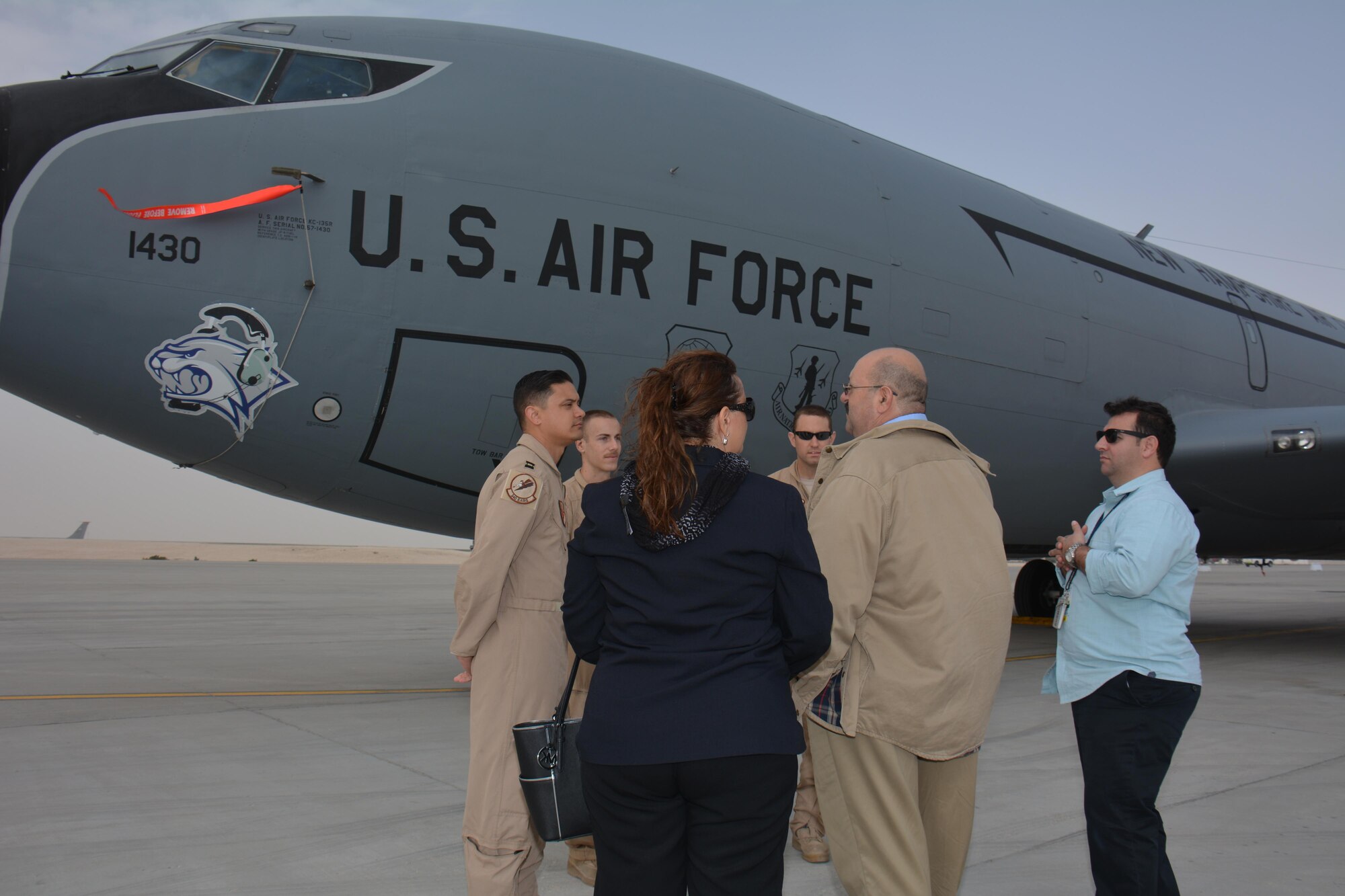 Attendees of the annual Flight Line Fest at Al Udeid Air Base, Qatar, Jan. 10 meet the crew of a KC-135 Stratotanker deployed from the 157th Air Refueling Wing in New Hampshire. The KC-135 fleet at AUAB, the largest in the world, flew more than 100,000 combat hours in 2015. The KC-135 was one of five U.S. Air Force aircraft on display during the event. Flight Line Fest is a joint partnership between the 379th Air Expeditionary Wing and Qatar Emiri Air Force held to foster relations between Qatar and the United States. (U.S. Air Force photo by Tech. Sgt. James Hodgman/Released)