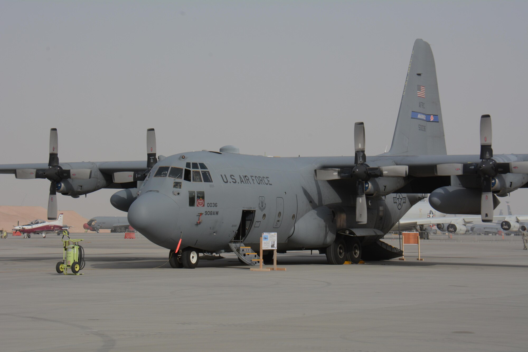 A C-130 Hercules from Maxwell Air Force Base, Alabama, waits for visitors at the annual Flight Line Fest Jan. 10 at Al Udeid Air Base, Qatar. The plane, which can take-off with a maximum weight of 155,000 pounds, was one of five U.S. Air Force aircraft on display during the event. Flight Line Fest is a joint partnership between the 379th Air Expeditionary Wing and Qatar Emiri Air Force to foster relations between Qatar and the United States. (U.S. Air Force photo by Tech. Sgt. James Hodgman/Released)