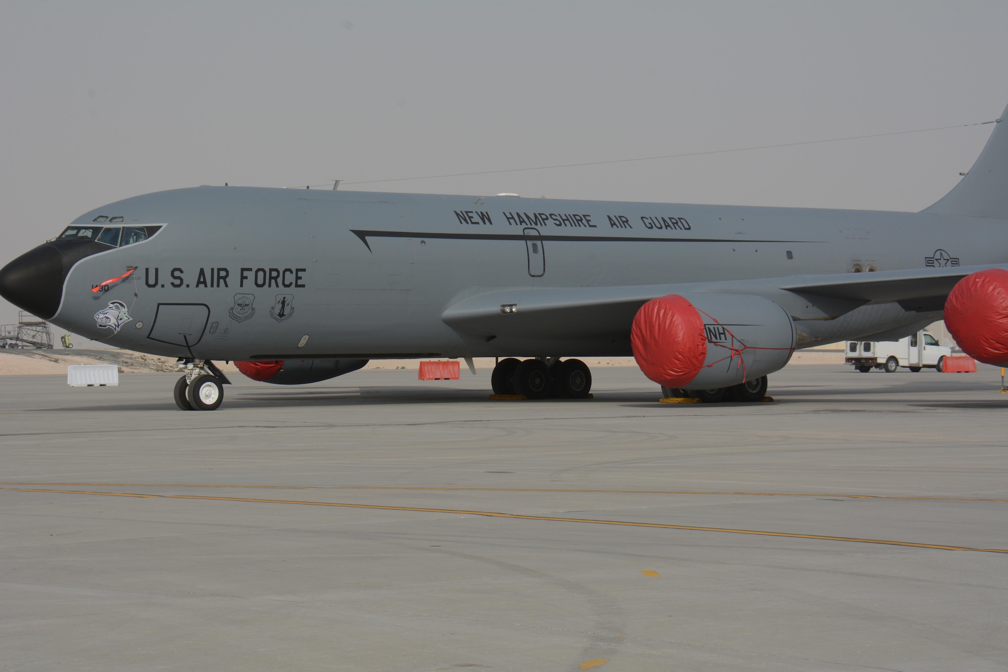 A KC-135 Stratotanker deployed from the 157th Air Refueling Wing in New Hampshire, waits for visitors at the annual Flight Line Fest Jan. 10 at Al Udeid Air Base, Qatar. The KC-135 fleet at AUAB, the largest in the world, flew more than 100,000 combat hours in 2015. The KC-135 was one of five U.S. Air Force aircraft on display during the event. Flight Line Fest is a joint partnership between the 379th Air Expeditionary Wing and Qatar Emiri Air Force held to foster relations between Qatar and the United States. (U.S. Air Force photo by Tech. Sgt. James Hodgman/Released)