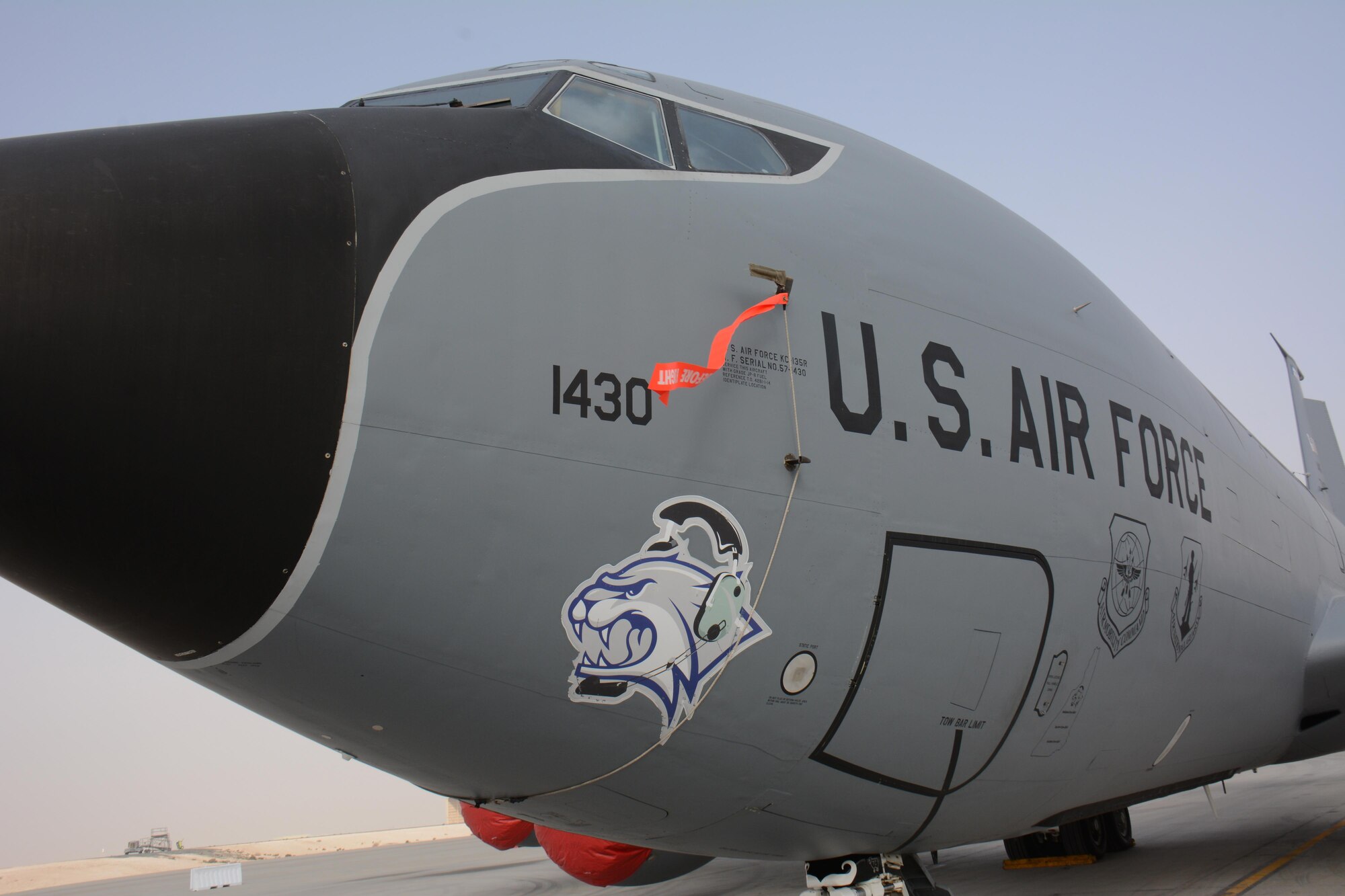 A KC-135 Stratotanker deployed from the 157th Air Refueling Wing in New Hampshire, waits for visitors at the annual Flight Line Fest Jan. 10 at Al Udeid Air Base, Qatar. The KC-135 fleet at AUAB, the largest in the world, flew more than 100,000 combat hours in 2015. The KC-135 was one of five U.S. Air Force aircraft on display during the event. Flight Line Fest is a joint partnership between the 379th Air Expeditionary Wing and Qatar Emiri Air Force held to foster relations between Qatar and the United States. (U.S. Air Force photo by Tech. Sgt. James Hodgman/Released)