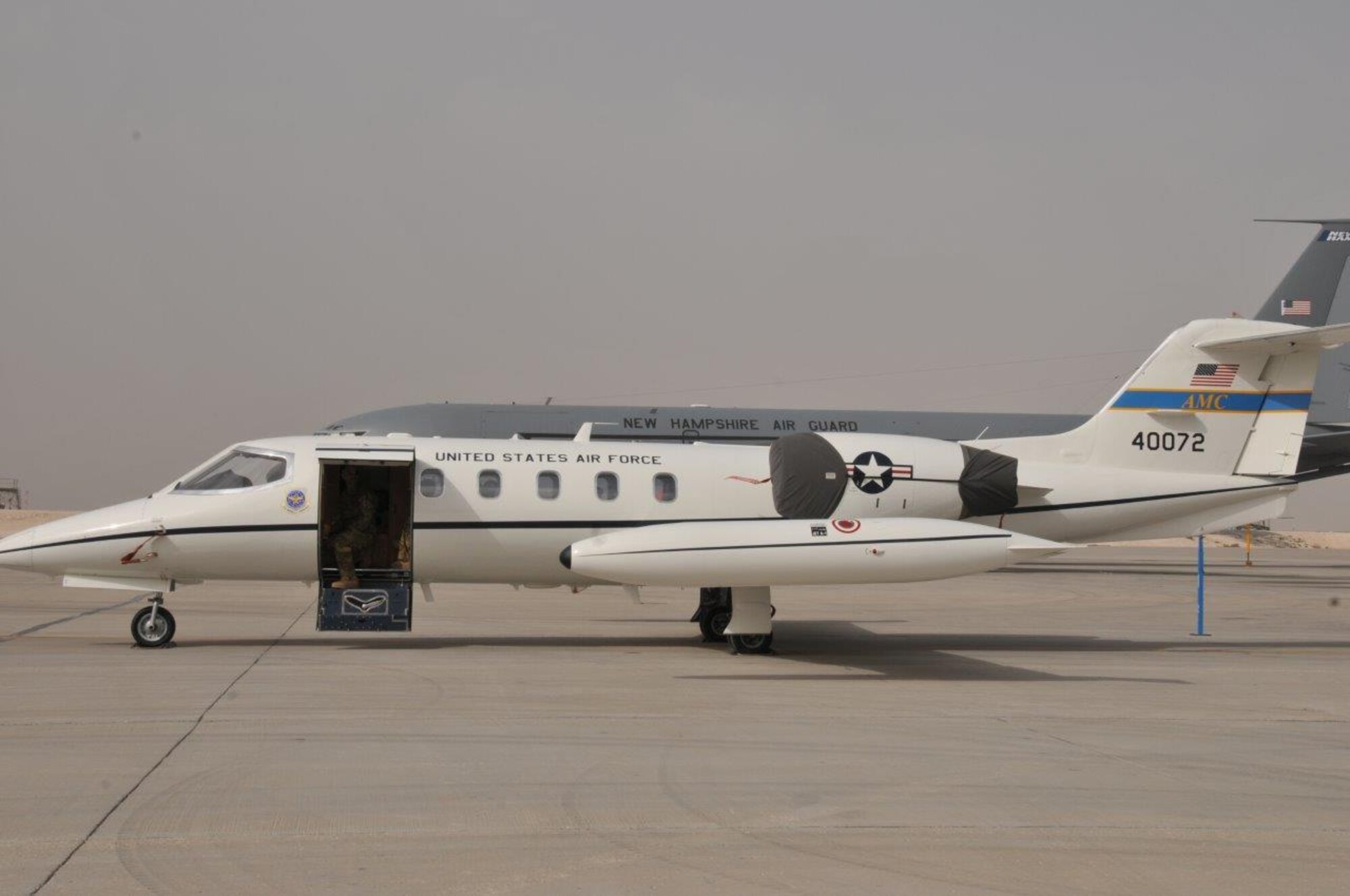 A C-21 Learjet waits for visitors at the annual Flight Line Fest Jan. 10 at Al Udeid Air Base, Qatar. Flight Line Fest is a joint partnership between the 379th Air Expeditionary Wing and Qatar Emiri Air Force held to foster relations between Qatar and the United States. (U.S. Air Force photo by Tech. Sgt. Terrica Y. Jones)