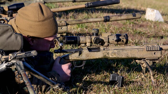 A Marine student undergoing the 2nd Marine Division Combat Skills Center Pre-Scout Sniper Course sights in on a target with a M40A5 sniper rifle at Marine Corps Base Camp Lejeune, North Carolina, Jan. 12, 2016. The 2nd Marine Division Combat Skills Center offers several infantry-based courses to enhance the combat readiness of its Marines. 