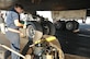 Senior Airman Alexis Anderson, a 379th Expeditionary Aircraft Maintenance Squadron crew chief, services oil on a B-1B Lancer during a post-flight inspection Jan. 11, 2016, at Al Udeid Air Base, Qatar. Inspections are done to every B-1 after a mission. Anderson is deployed with the 307th Expeditionary Aircraft Maintenance Unit from Ellsworth Air Force Base, South Dakota. (U.S. Air Force photo/Tech. Sgt. Terrica Y. Jones)