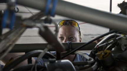 Nicole Goss, 12th Flying Training Maintenance Directorate crew chief, inspects a T-6 Texan II prior to take off Sept. 24, 2015, at Joint Base San Antonio-Randolph. Since she started in the 12th Flying Training Wing Maintenance Directorate at Joint Base San Antonio-Randolph 12 years ago, Nicole Goss has worked her way from intern to crew chief.