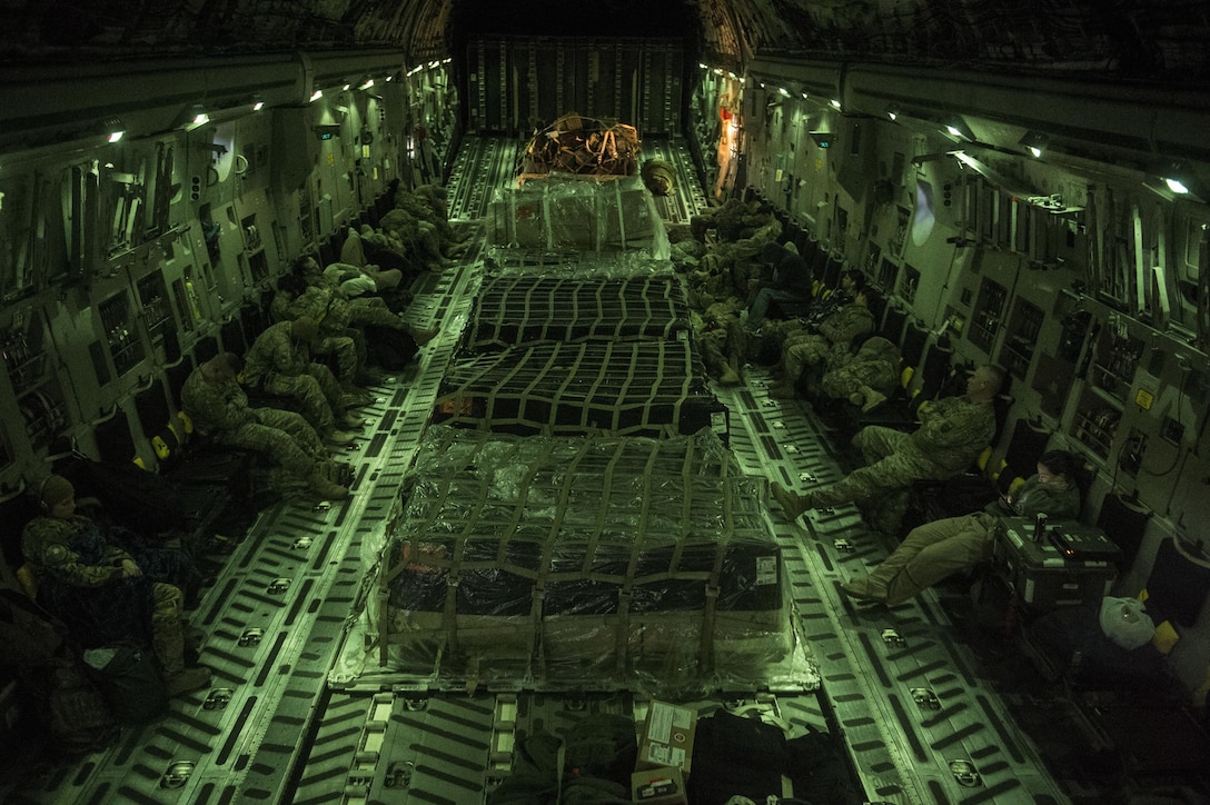 A U.S. Air Force C-17 Globemaster III aircraft  transports cargo and passengers from Al Udeid Air Base, Qatar, in support of Operation Resolute Support, Jan. 13, 2016. U.S. Air Force photo by Staff Sgt. Corey Hook
