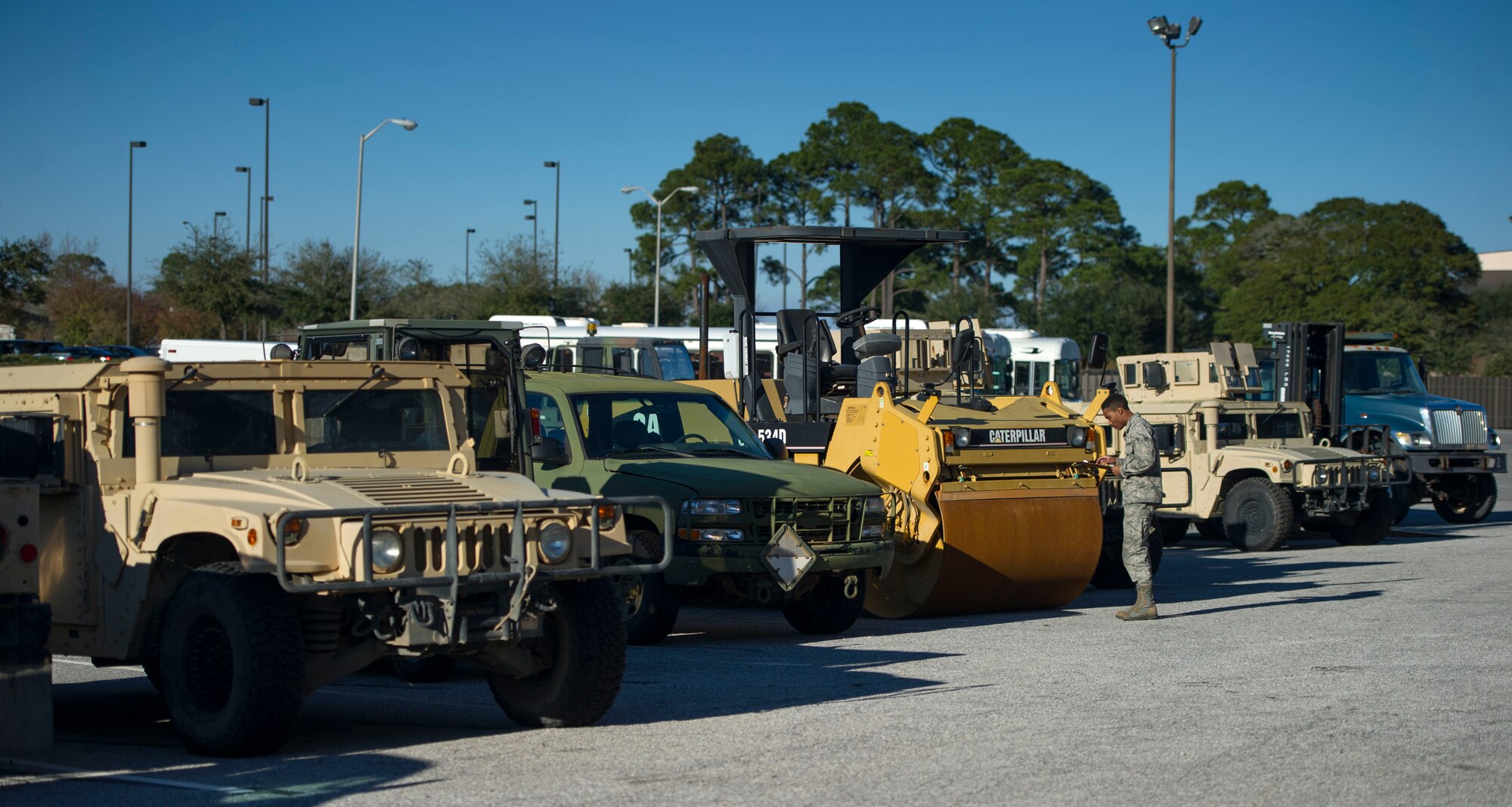 Airman 1st Class Jordan Artis, a vehicle management analysis journeyman with the 1st Special Operations Logistics Readiness Squadron, performs a yard check on Hurlburt Field, Fla., Jan. 12, 2016. Yard checks are conducted to ensure vehicles are accounted for. (U.S. Air Force photo by Senior Airman Krystal M. Garrett) 