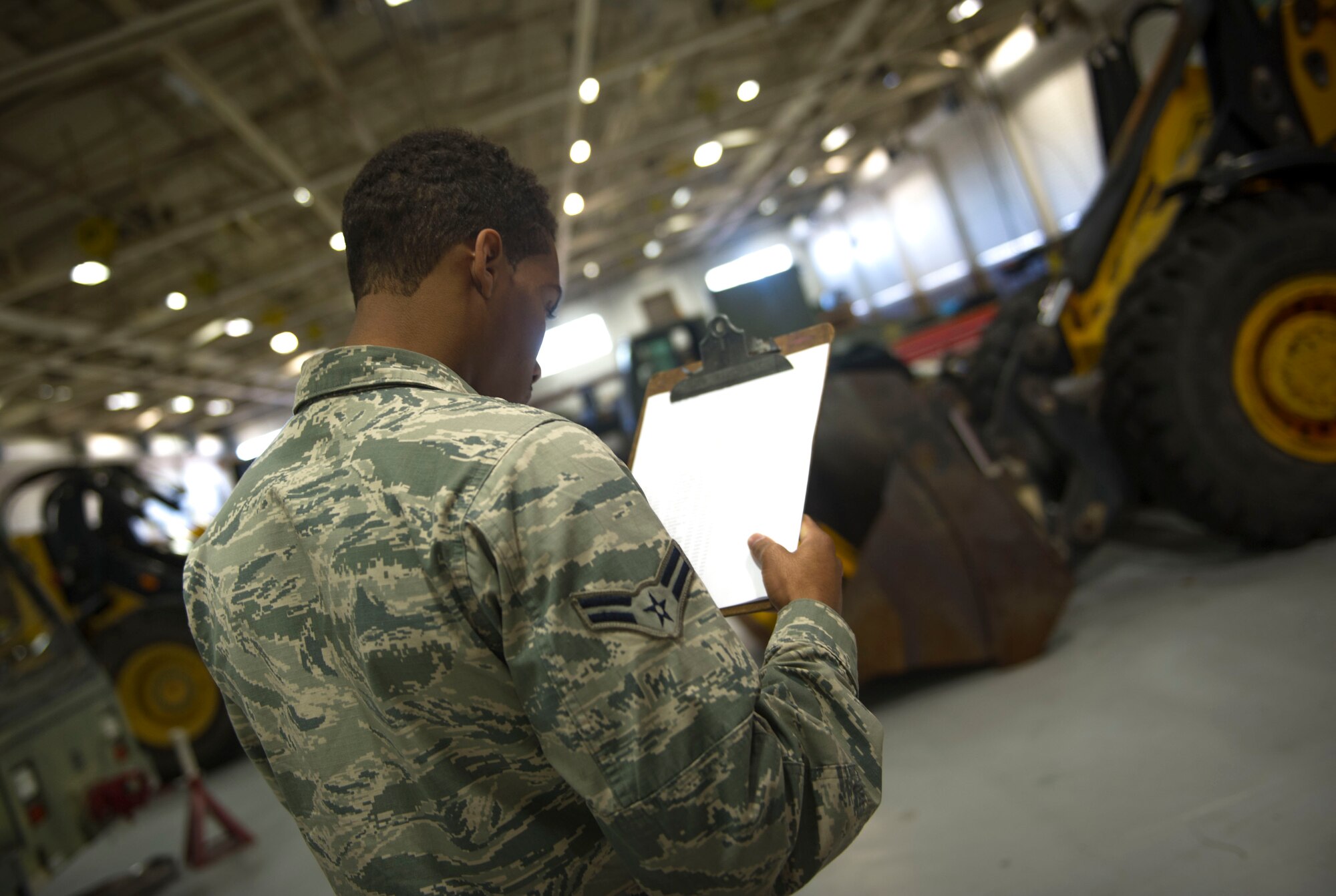 Airman 1st Class Jordan Artis, a vehicle management analysis journeyman with the 1st Special Operations Logistics Readiness Squadron, performs a yard check on Hurlburt Field, Fla., Jan. 12, 2016. A yard check is conducted to ensure all vehicles are accounted for. (U.S. Air Force photo by Senior Airman Krystal M. Garrett)