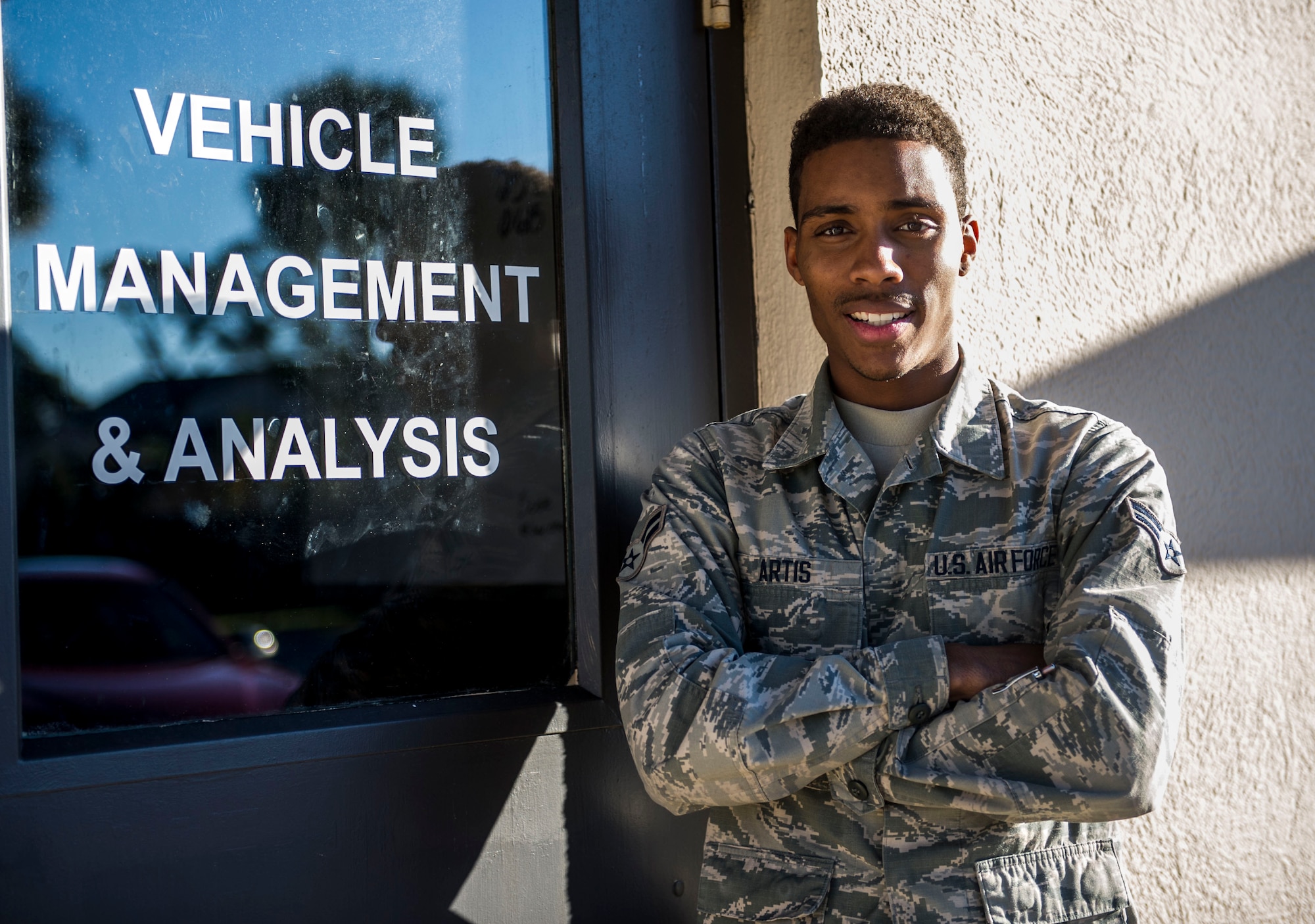Airman 1st Class Jordan Artis, a vehicle management analysis journeyman with the 1st Special Operations Logistics Readiness Squadron, poses for a photo at Hurlburt Field, Fla., Jan. 12, 2016. Artis is in charge of the VCO program. (U.S. Air Force photo by Senior Airman Krystal M. Garrett)