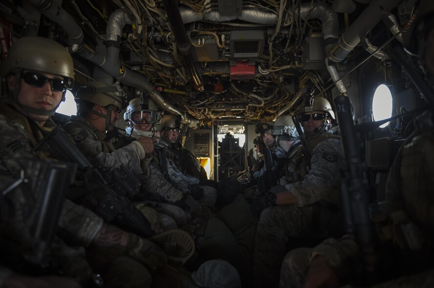 Airmen with the 1st Special Operations Security Forces Squadron await takeoff on a CV-22 Osprey for exercise Frigid Archer 2016 at Hurlburt Field, Fla., Jan. 6, 2016. Frigid Archer was a week-long exercise that tested 1st Special Operations Wing Air Commandos' expertise through a myriad of operational and support requirements. (U.S. Air Force photo by Senior Airman Ryan Conroy)  
