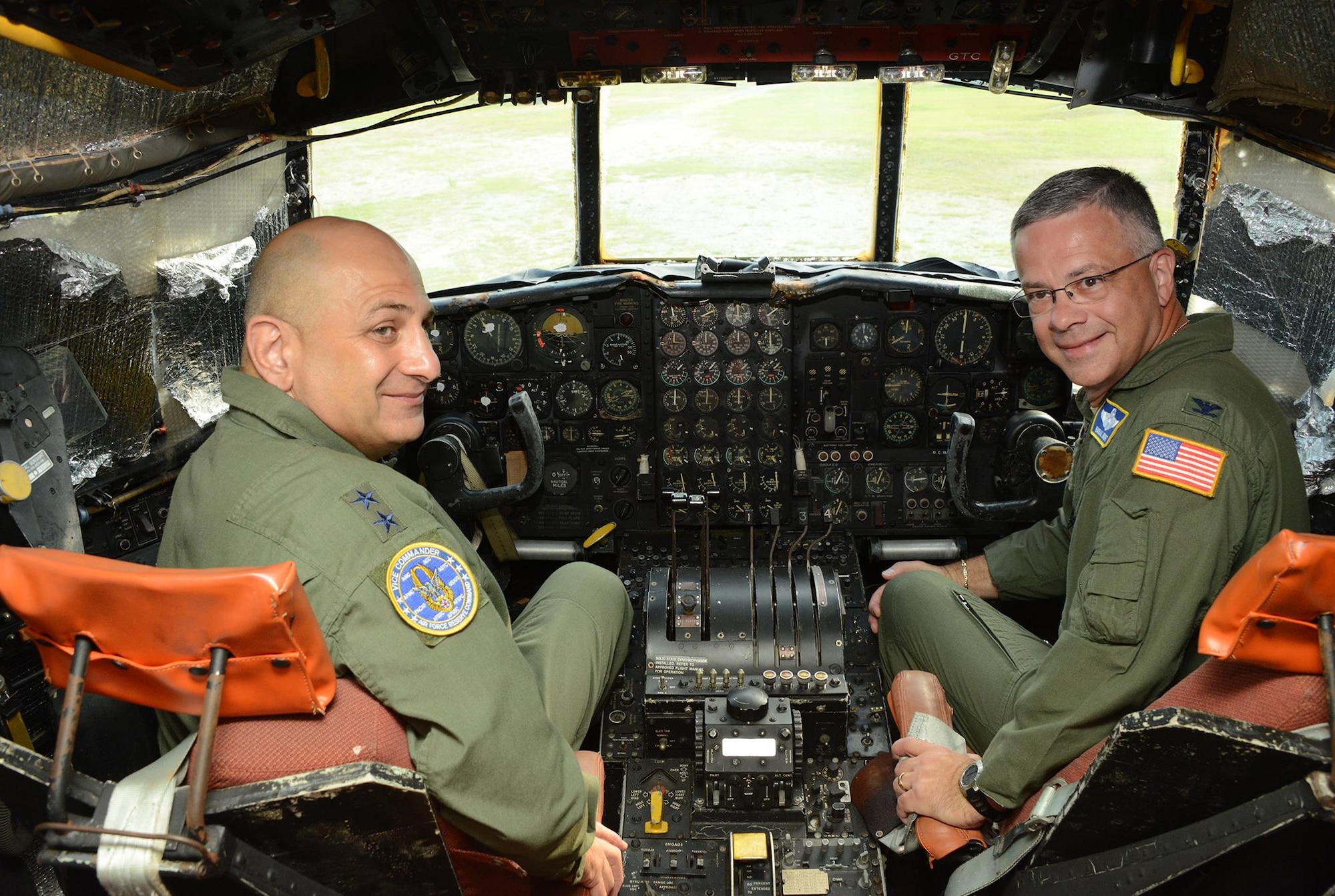 Maj. Gen. Richard S. “Beef” Haddad, left, and Col. Randal L. Bright get reacquainted with the cockpit of No. 55-0014, the AC-130A gunship they flew into combat in 1991. Haddad is vice commander of Air Force Reserve Command, while Bright serves as chief of the plans division in the Air Force Reserve Command Directorate of Plans and Programs at Robins Air Force Base, Ga. (U.S. Air Force photo/Master Sgt. Chance Babin)