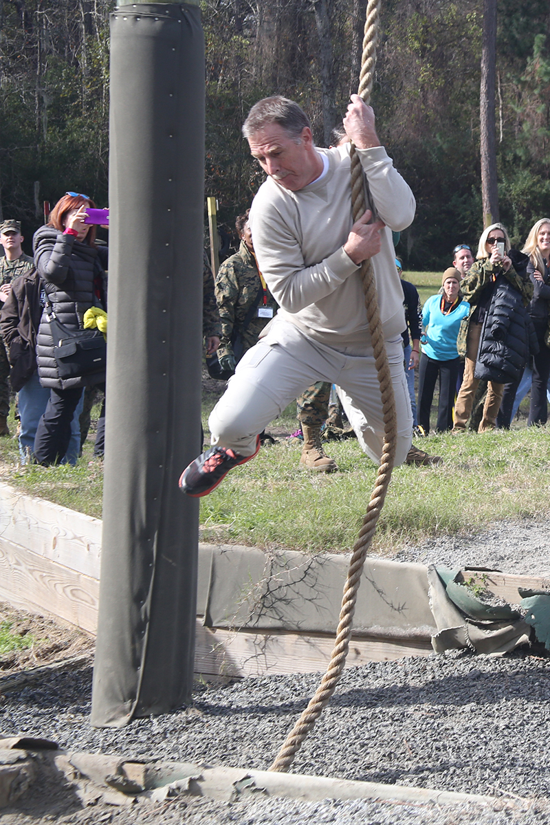 Ken Allen, a teacher from Hudson High School and part of the Recruiting Station Orlando group, swings across the ditch below in one of the obstacles that make up the Confidence Course, aboard Marine Corps Recruit Depot Parris Island, S. C., January 14, 2016. The teachers, coaches and principals are part of a larger group of 80 high school educators from Florida selected to participate in a three-day workshop designed to inform educators about military service and life in the Marine Corps. (Official Marine Corps photo by Cpl. John-Paul Imbody)