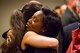 Jamaesha Sweatt (right) hugs Deborah Wyatt in an Anchorage, Alaska, courtroom. Wyatt’s son, Lane, was sentenced to nearly two decades in prison for the drunk-driving death of Sweatt’s sister, Citari Townes-Sweatt. (Courtesy photo by Loren Holmes/ Alaska Dispatch News)