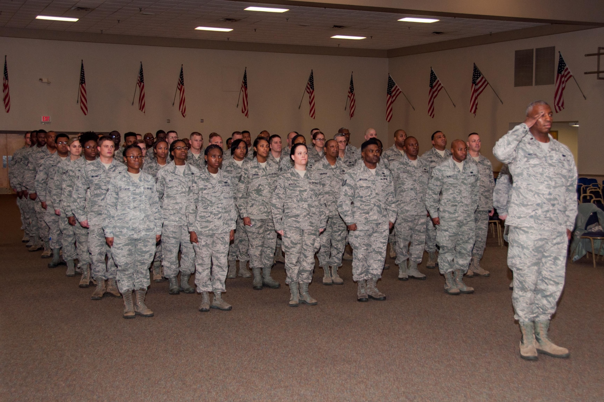 U.S. Air Force Airmen of the 307th Logistics Readiness Squadron render a first salute to their new commander, Maj. Charles R. DeLongchamp III, at a change of command ceremony on Jan. 9, 2016, Barksdale Air Force Base, La. DeLongchamp was the principle advisor to the 10th Air Force Director of Logistics for all Logistics Readiness issues. (U.S. Air Force photo by Master Sgt. Laura Siebert/Released)