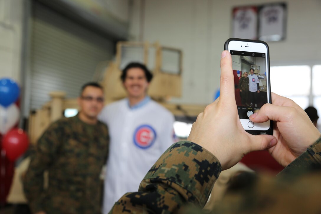 Marines and sailors of the 9th Marine Corps District and Naval Station Great Lakes dined with Chicago Cubs players at the USO of Illinois’ Cub’s Caravan Luncheon Jan. 14, in downtown Chicago. Cub’s players mingled with service members over lunch at the free event, which is part of the TixForTroops program in the state of Illinois. 
