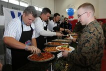Marines and sailors of the 9th Marine Corps District and Naval Station Great Lakes dined with Chicago Cubs players at the USO of Illinois’ Cub’s Caravan Luncheon Jan. 14, in downtown Chicago. Cub’s players mingled with service members over lunch at the free event, which is part of the TixForTroops program in the state of Illinois. 
